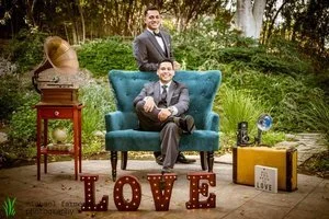 Blue Love Seat, Red Table &amp; Suitcases