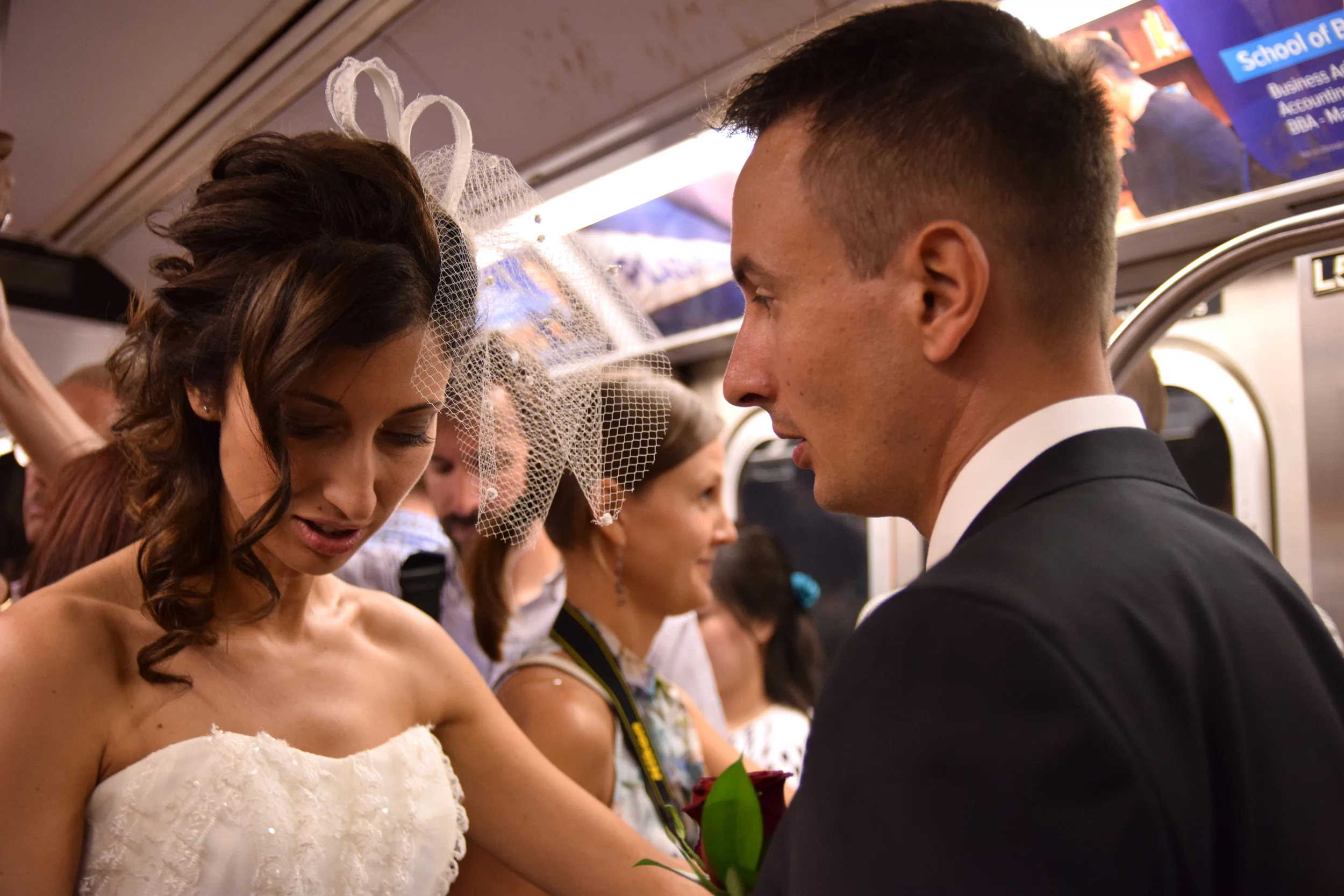 Bride Looks Down Groom At Her.jpg