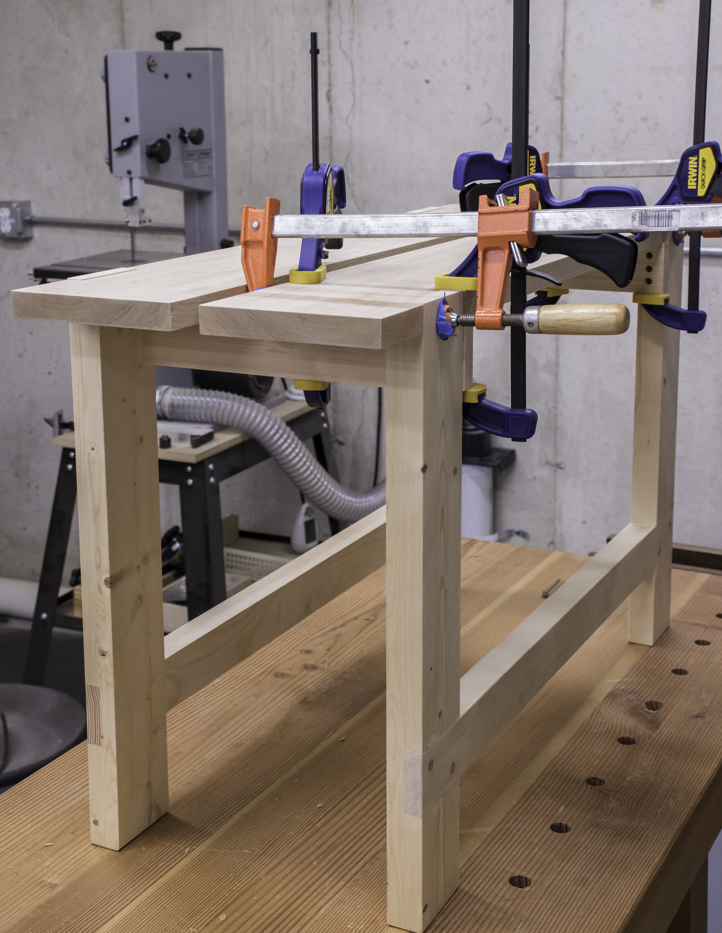 Gluing the top boards to the legs.