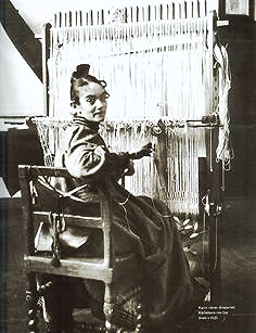  Larsson, an avid textile and furniture designer was the wife and muse of the late, Carl Larsson. The textile depicted here is attached to her original loom. While raising her eight children, Larsson still designed all the furniture and textiles in her home. Above: Larsson at her loom
