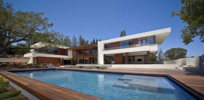 relaxing-outdoor-swimming-pool-in-rectangular-design-completed-with-wooden-decking-surrounding-for-lounge-and-sitting-area-663x327.jpg