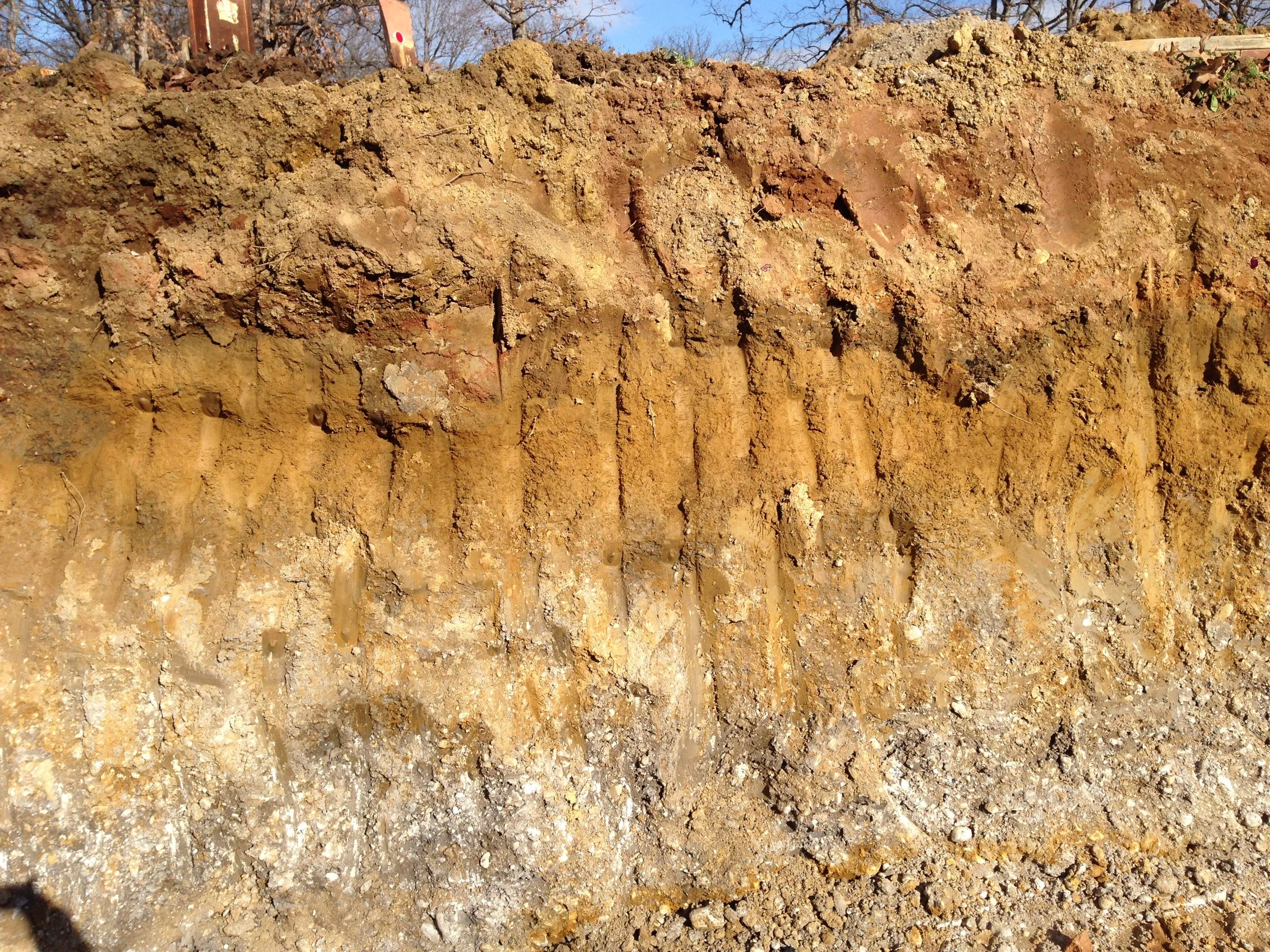 The excavation is to the required depth along the north and west walls. 