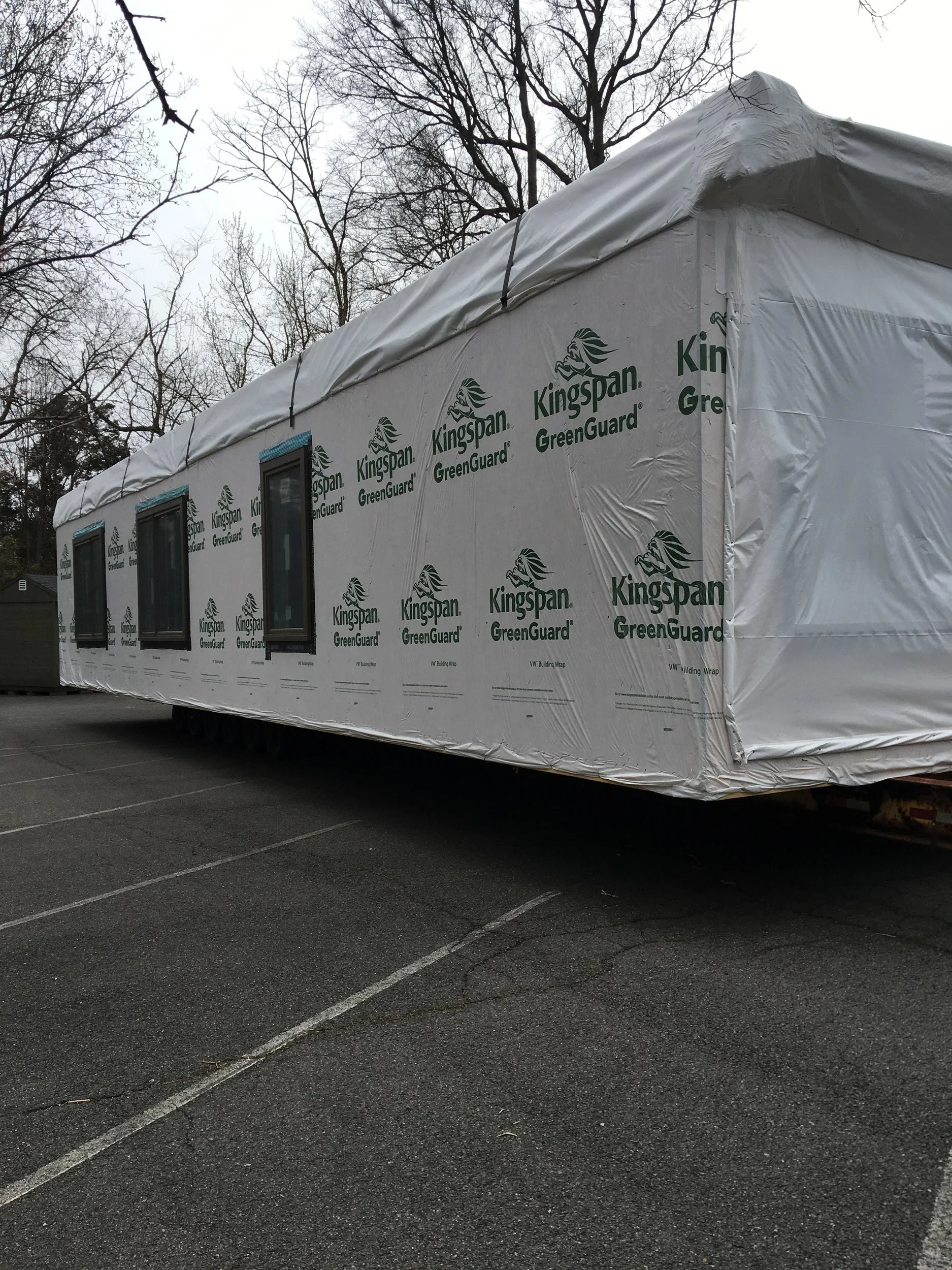 The modular units finally arrive! They are only 2.1 miles from our property!