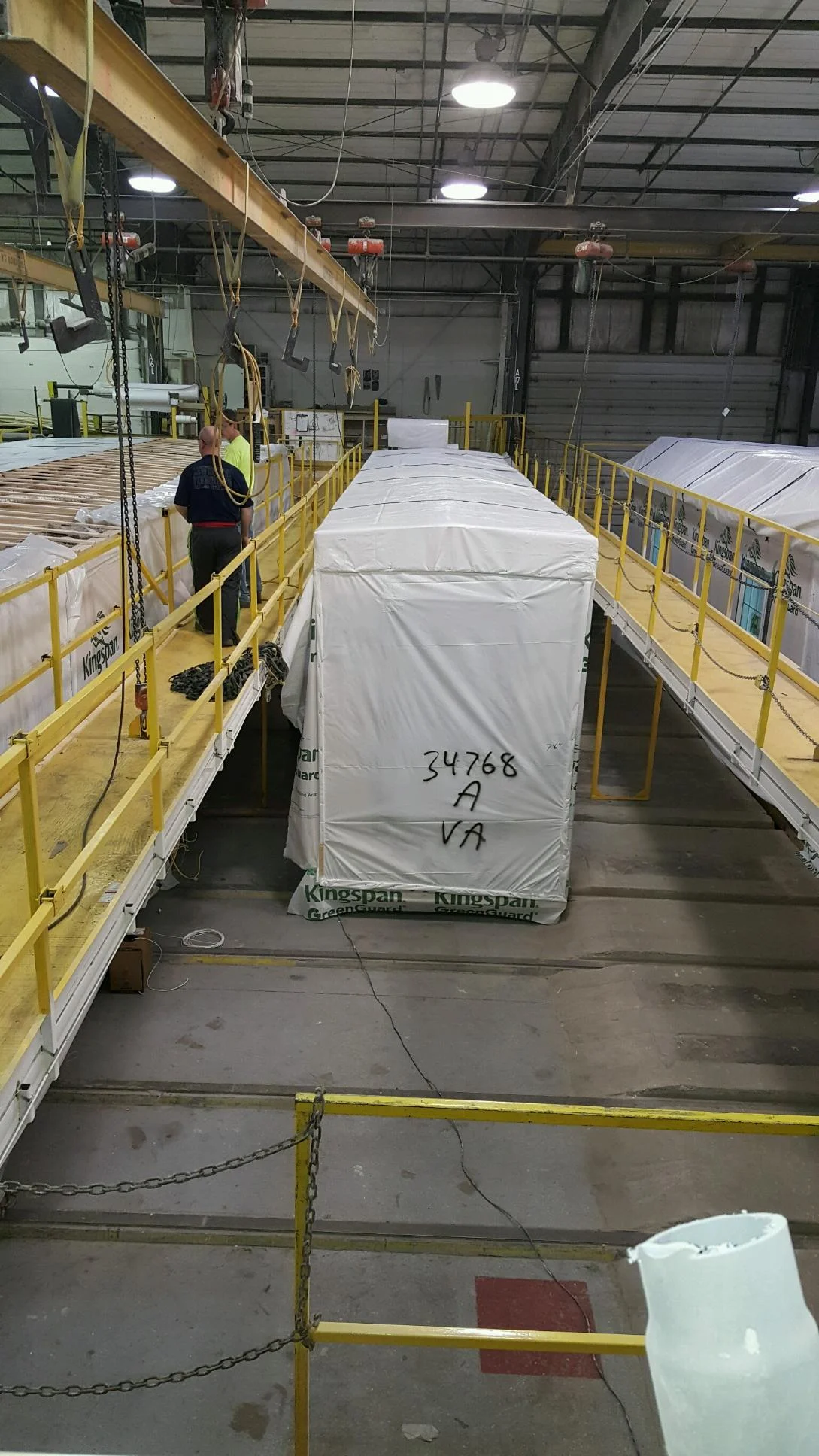 The modular unit in the factory waiting to be taking outside.
