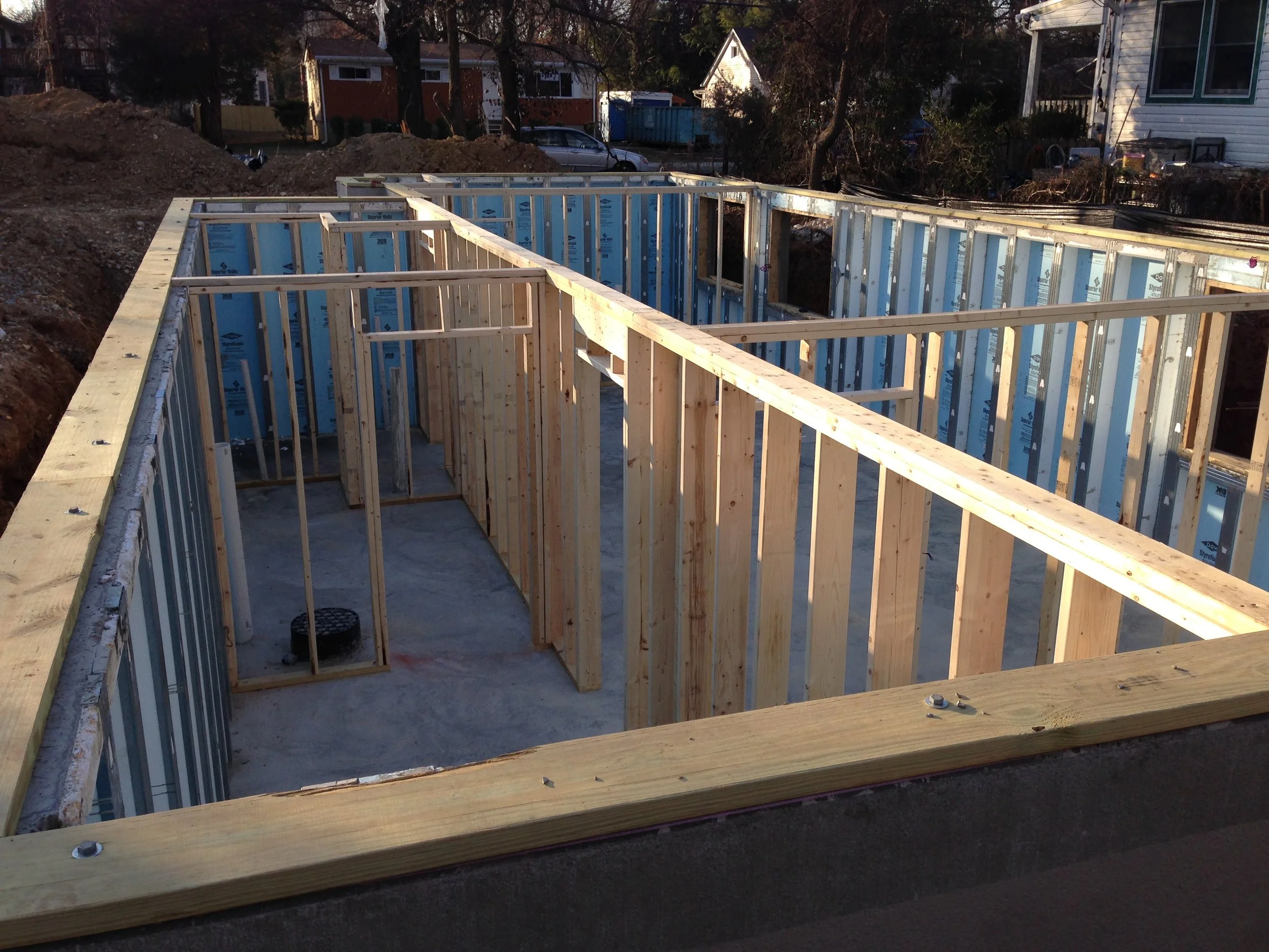 8:00 - Basement framing was completed yesterday with 15 minutes to spare. Looks good. Lots of storage space and big windows! The wall down the middle will hold half of the modular units. I hope it stays strong!