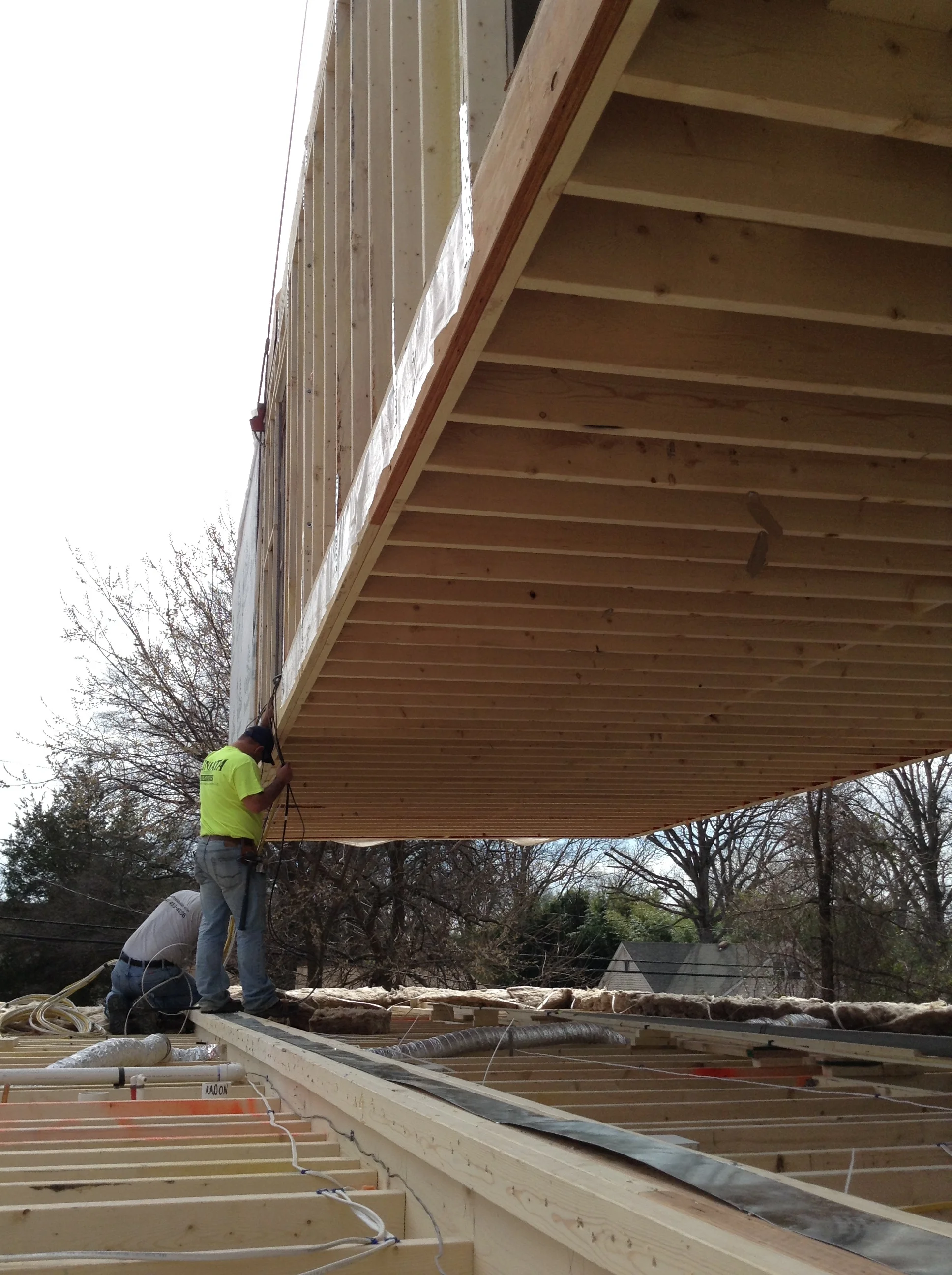 11:23 - The wires have been placed. Notice that there is a ceiling for the first floor and a floor for the second. That equals about 20" of space from the ceiling to the floor which will help acoustics. Also it provides a space in the first floor ceiling to run all the conduits and equipment.