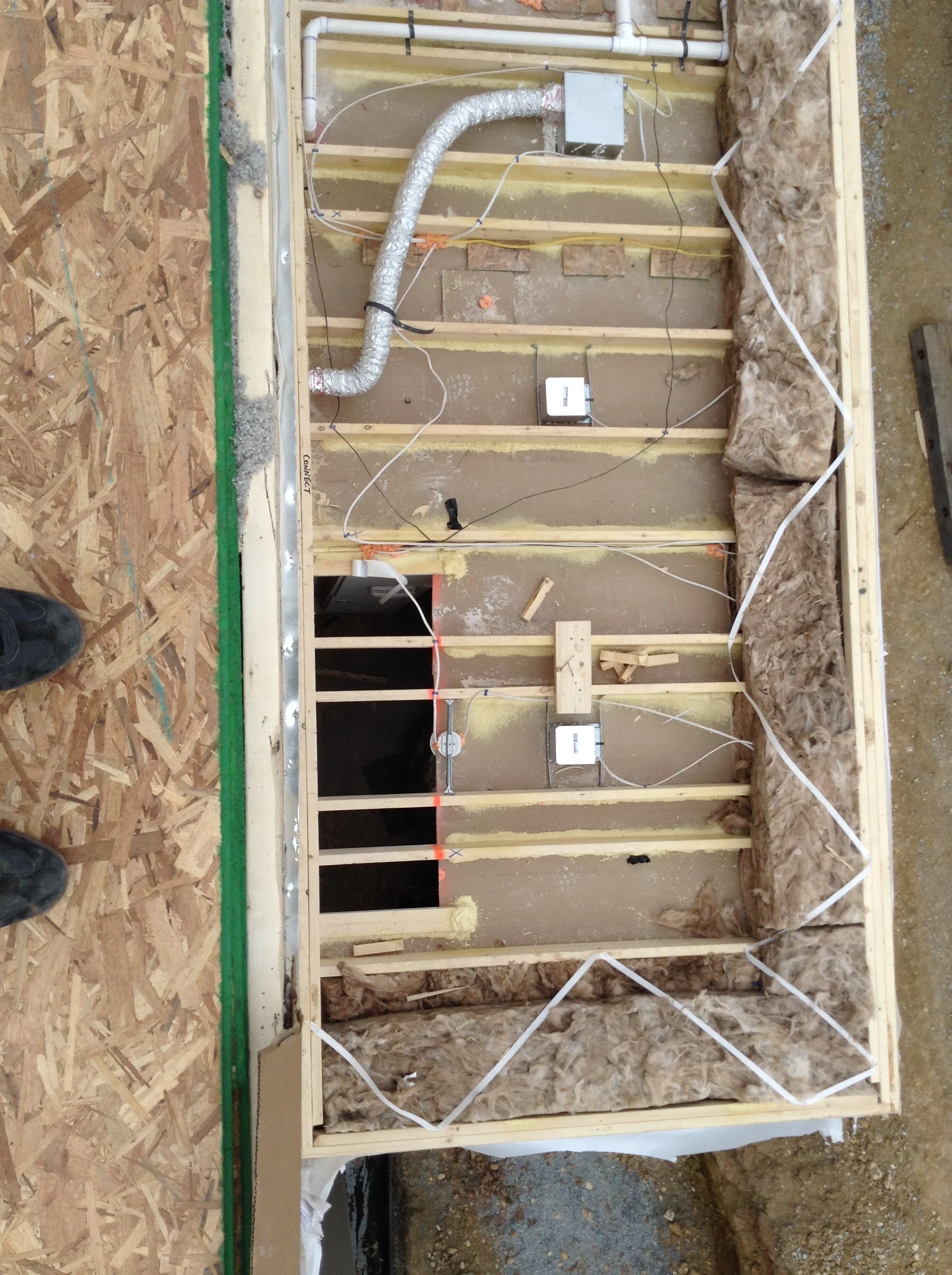 11:40 - Looking down onto the first floor ceiling above the powder room and main entry. The sides are nicely insulated and all the drywall is also glued to the wood. 