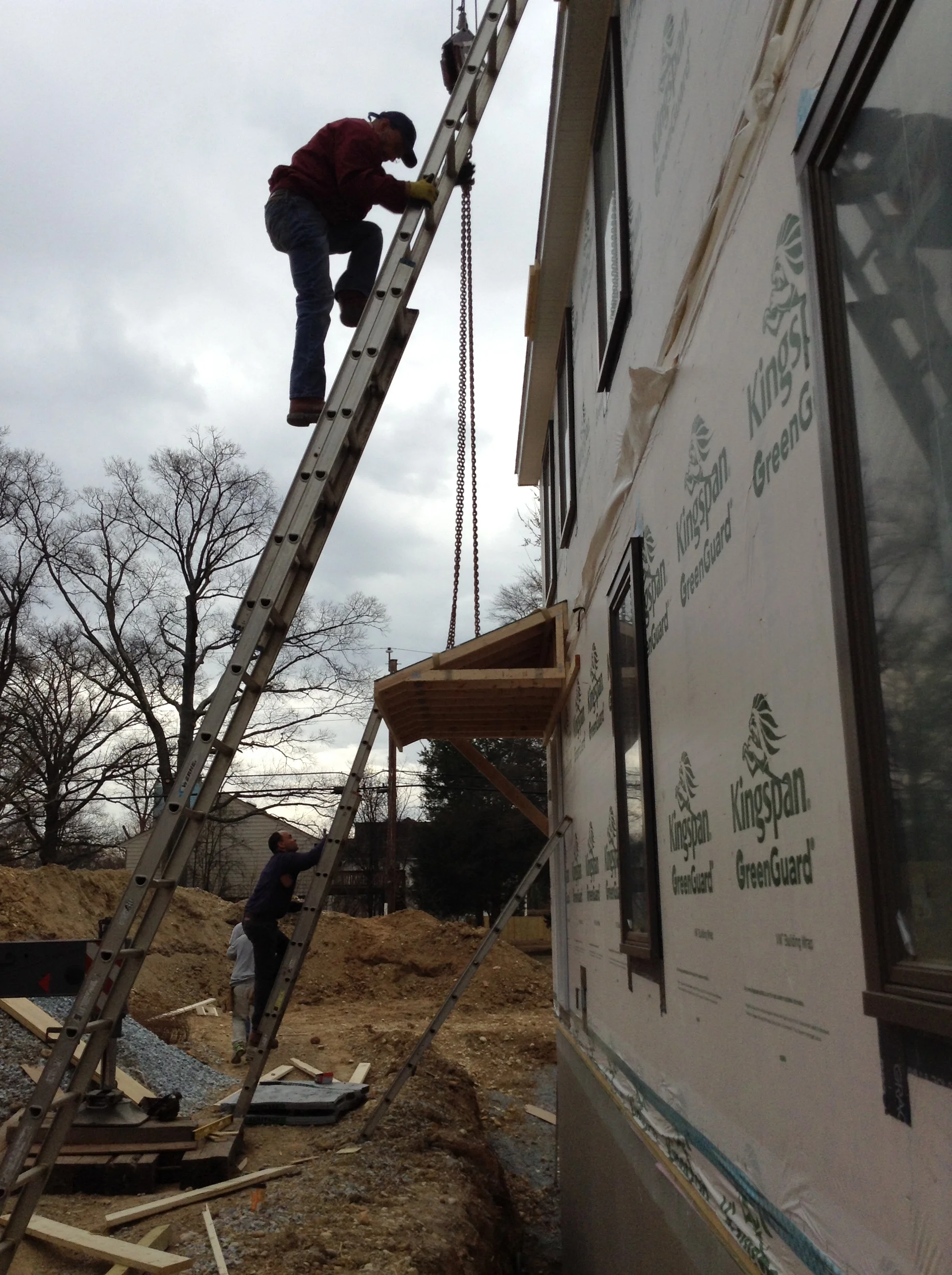 16:00 - Now that the main units are installed and the house is watertight the additional featurs are installed. This includes the porch and chimney. Due do the backfill not in place yet the porch is being cantilevered off the side. It will remain like for about 2 weeks. 