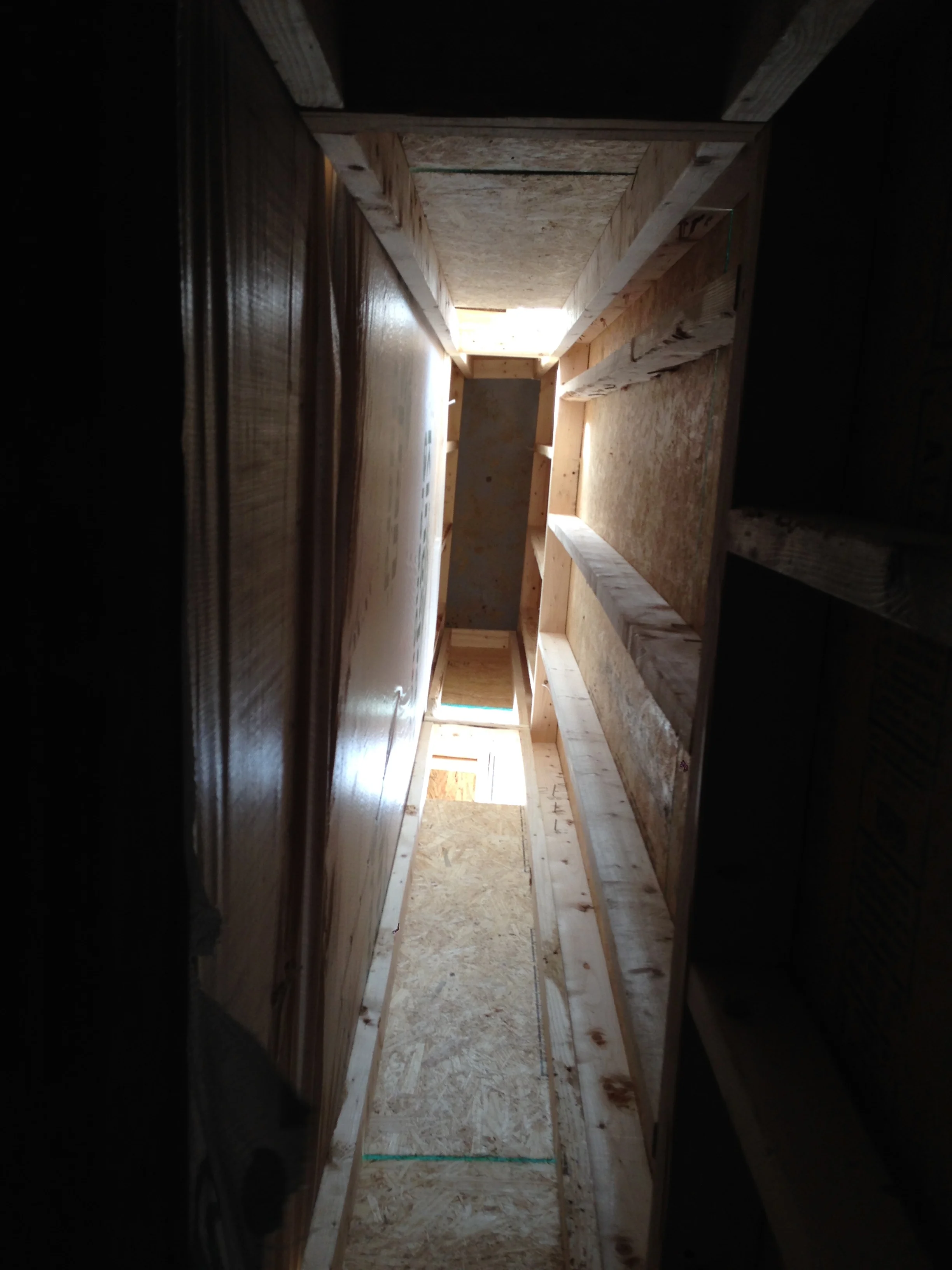 Looking up inside the chimney shaft. Should be interesting to see how they are going to install the flue to the top.
