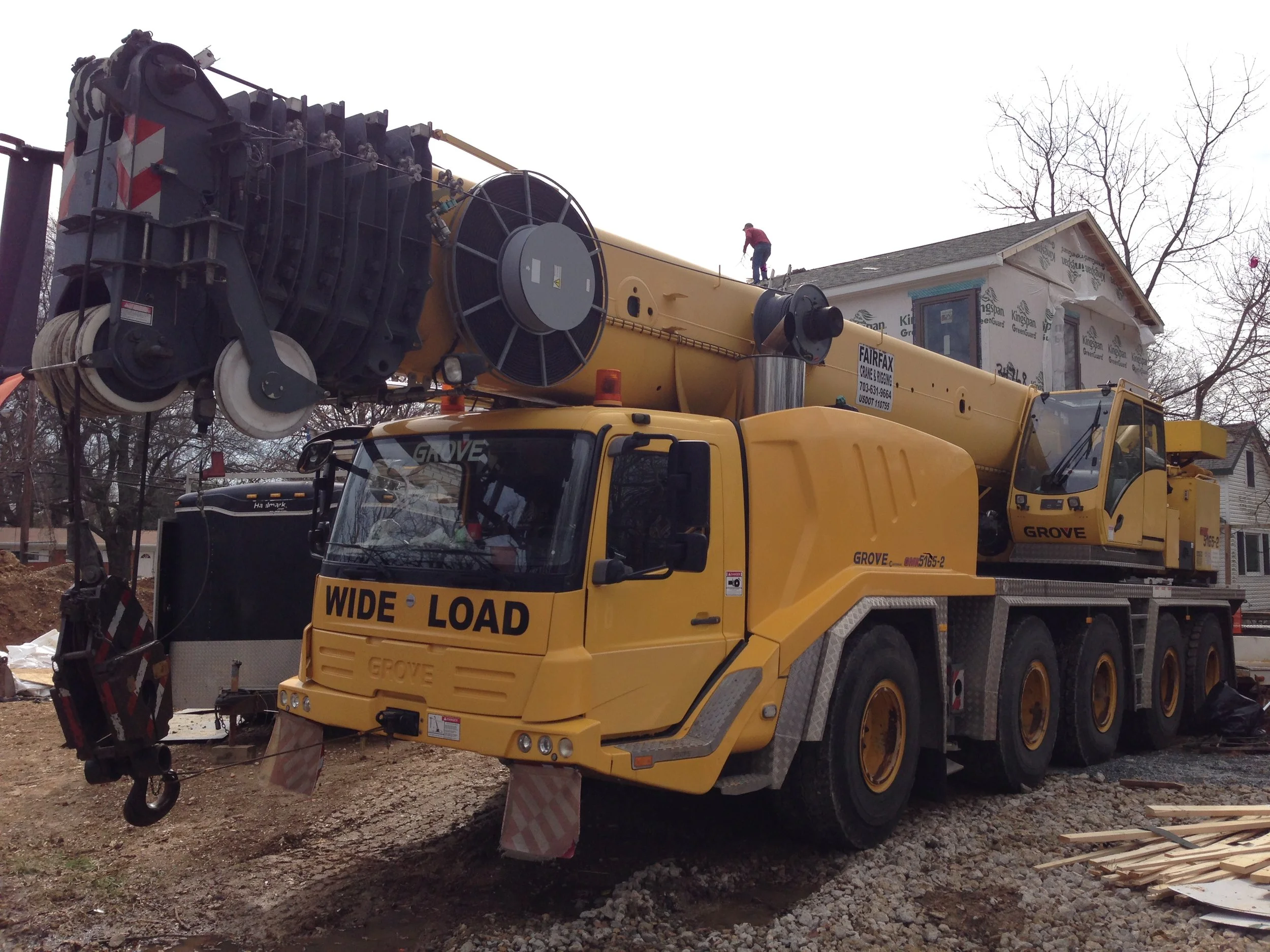 One last photo of the crane before it left. It was so heavy it ruined my construction entry. I'll probably have to fix that because the storms have cause there to be a small puddle. Lots of mud today.
