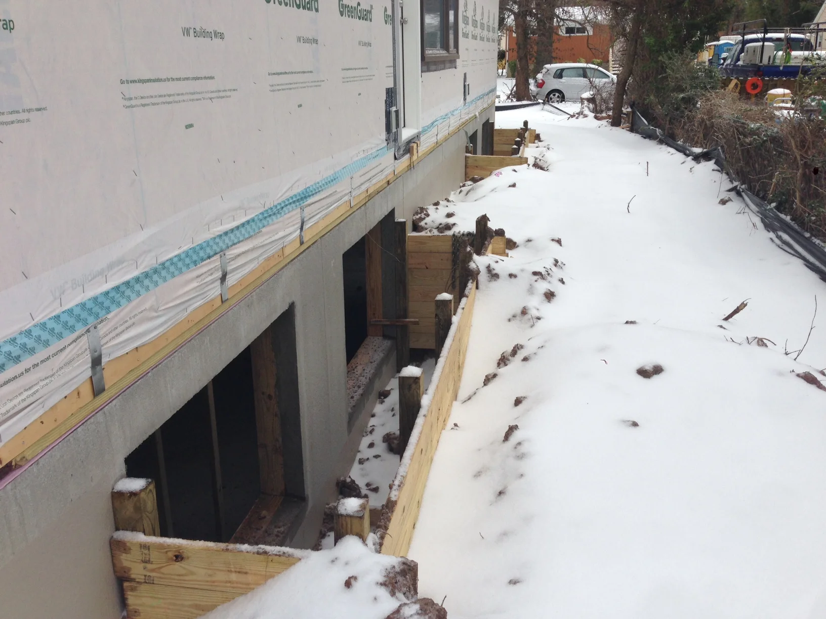Window wells are doing their job. Now we just have to install windows. 