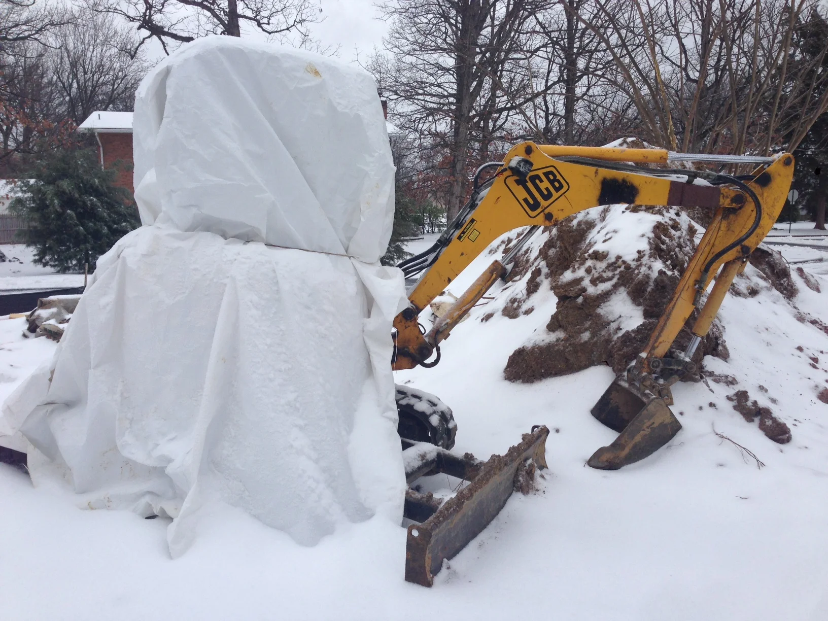 Even excavator have stay warm. 