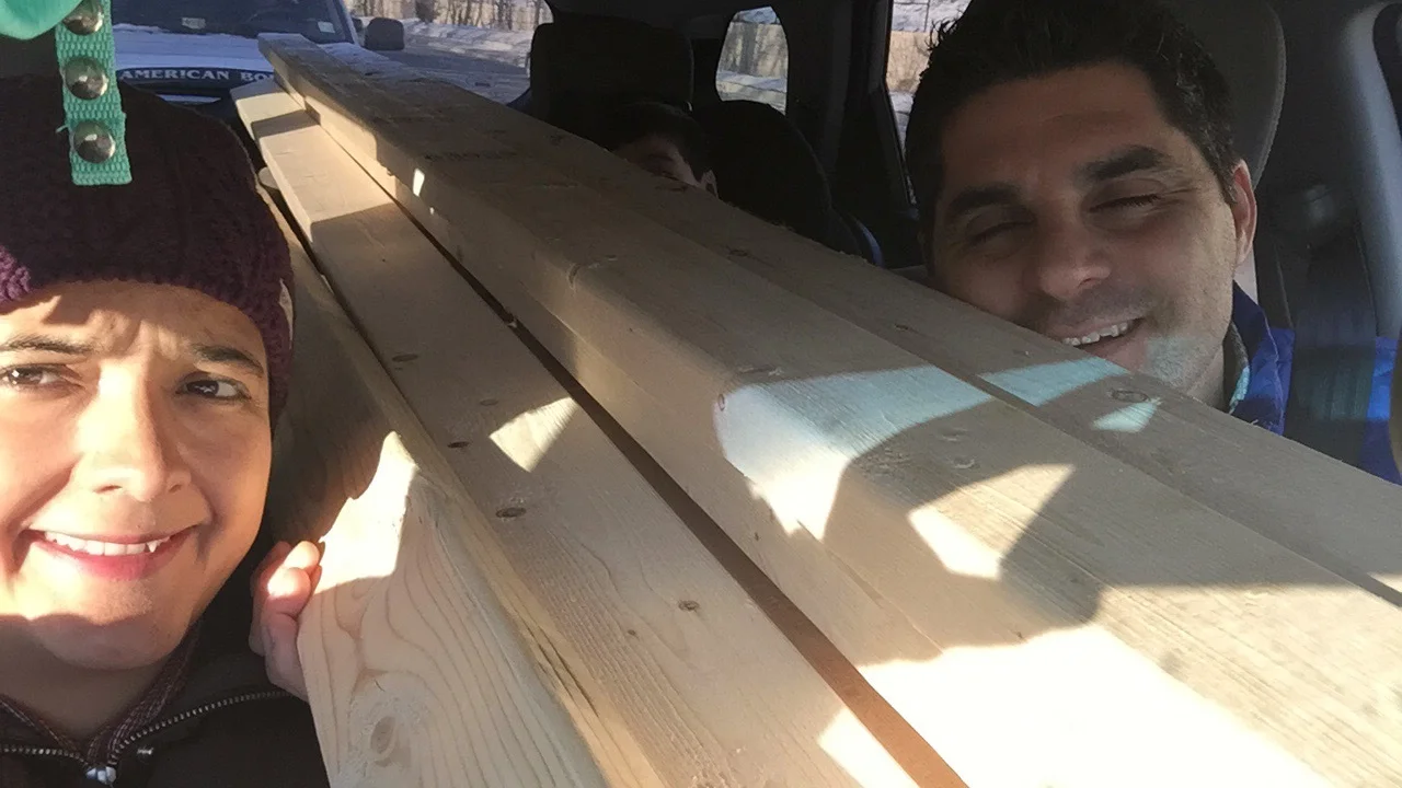 Squeezing into the car with 8 - 2" x 4" x 10'. Pedro is somewhere in the back. We promised our car that after we are done with the house we will treat it to a detail. Maybe two.
