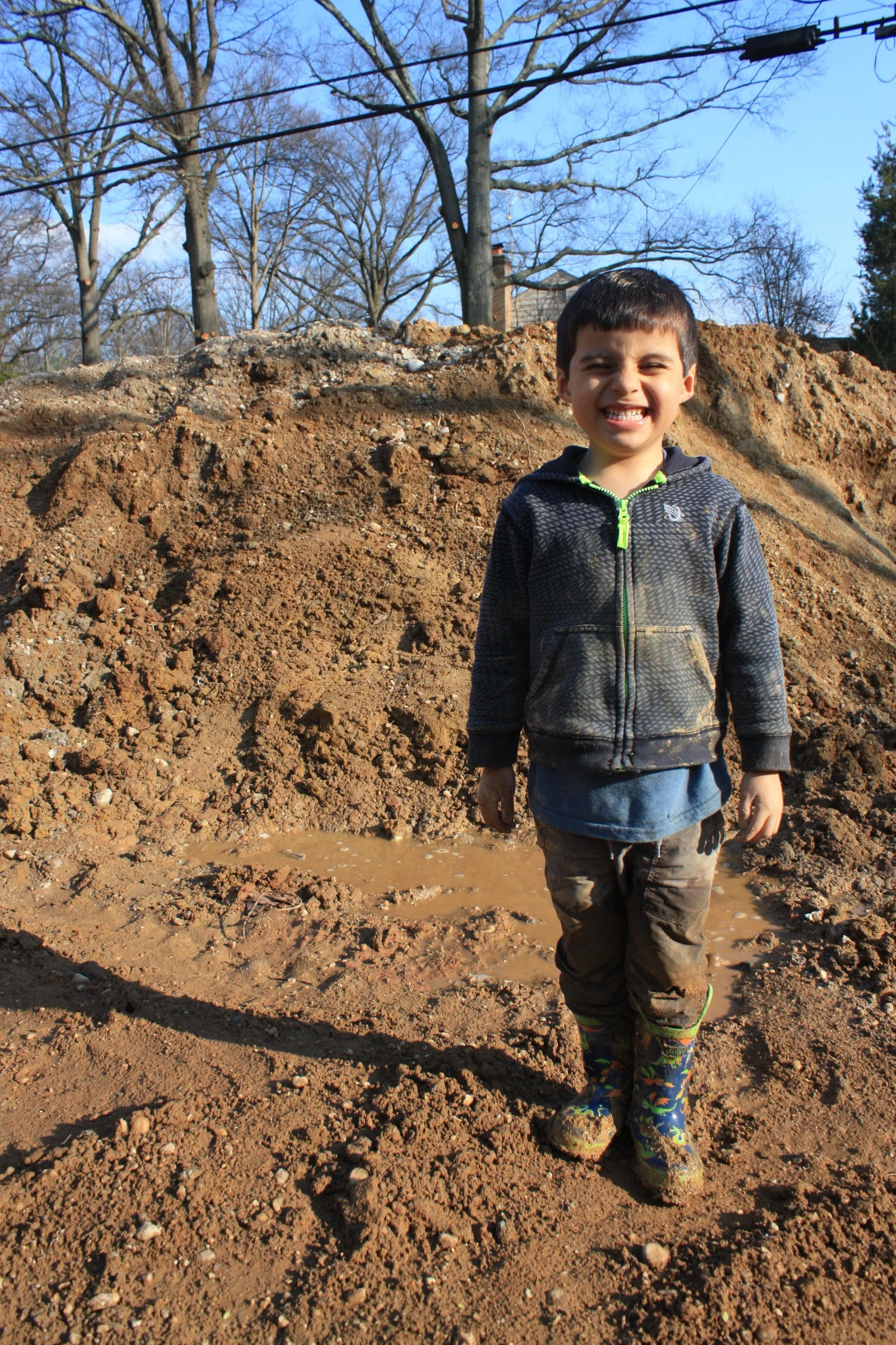 Pedro was able to find all the mud and then some. Needless to say this is his new construction clothes.
