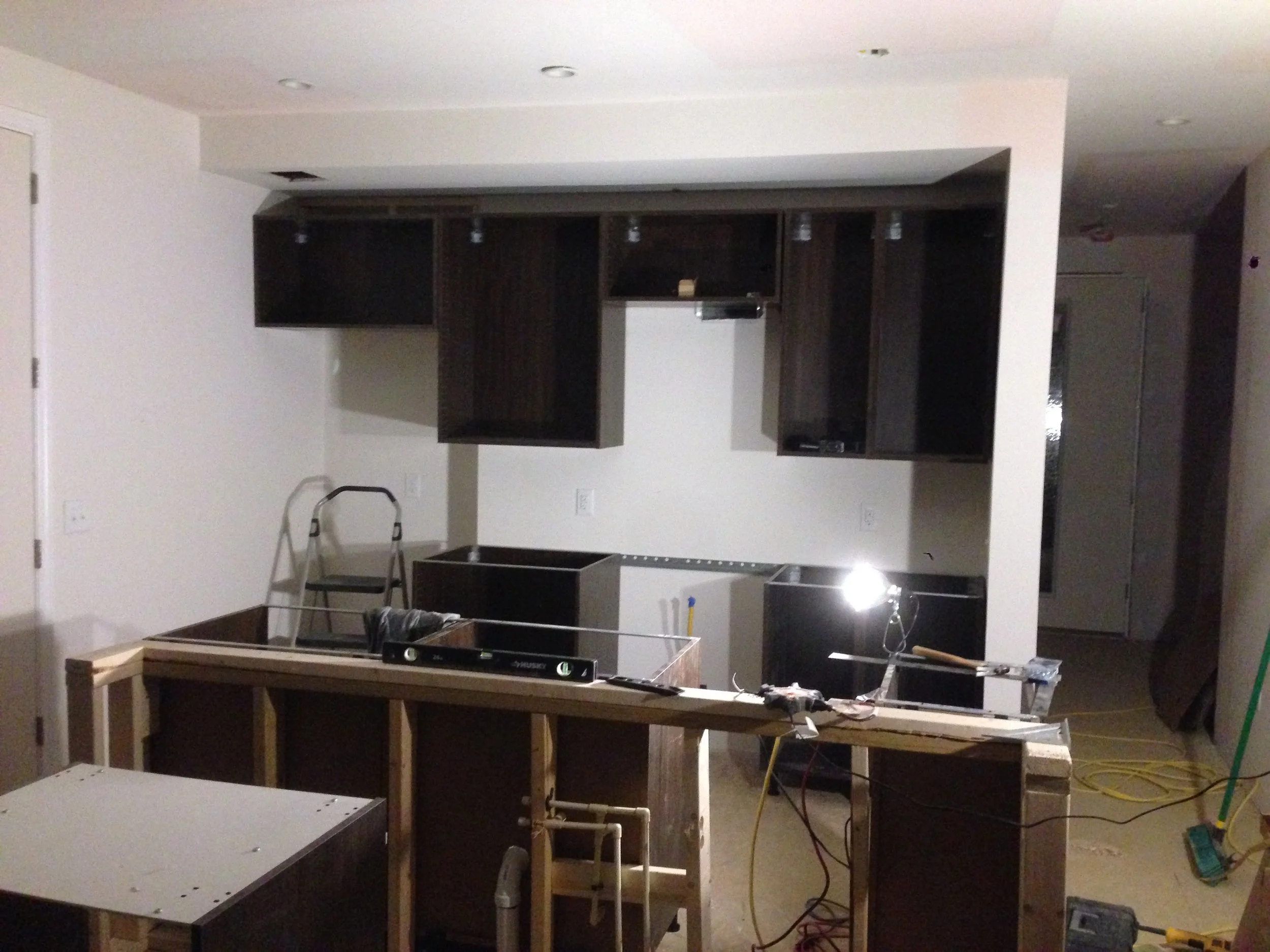 Kitchen cabinet boxes installed and ready for counter top measurements. 