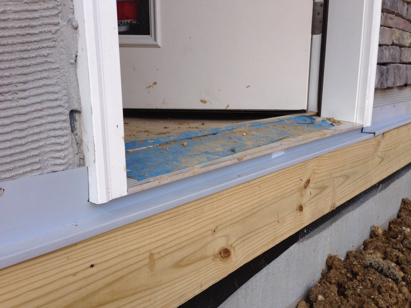 Flashing installed above the deck ledger.