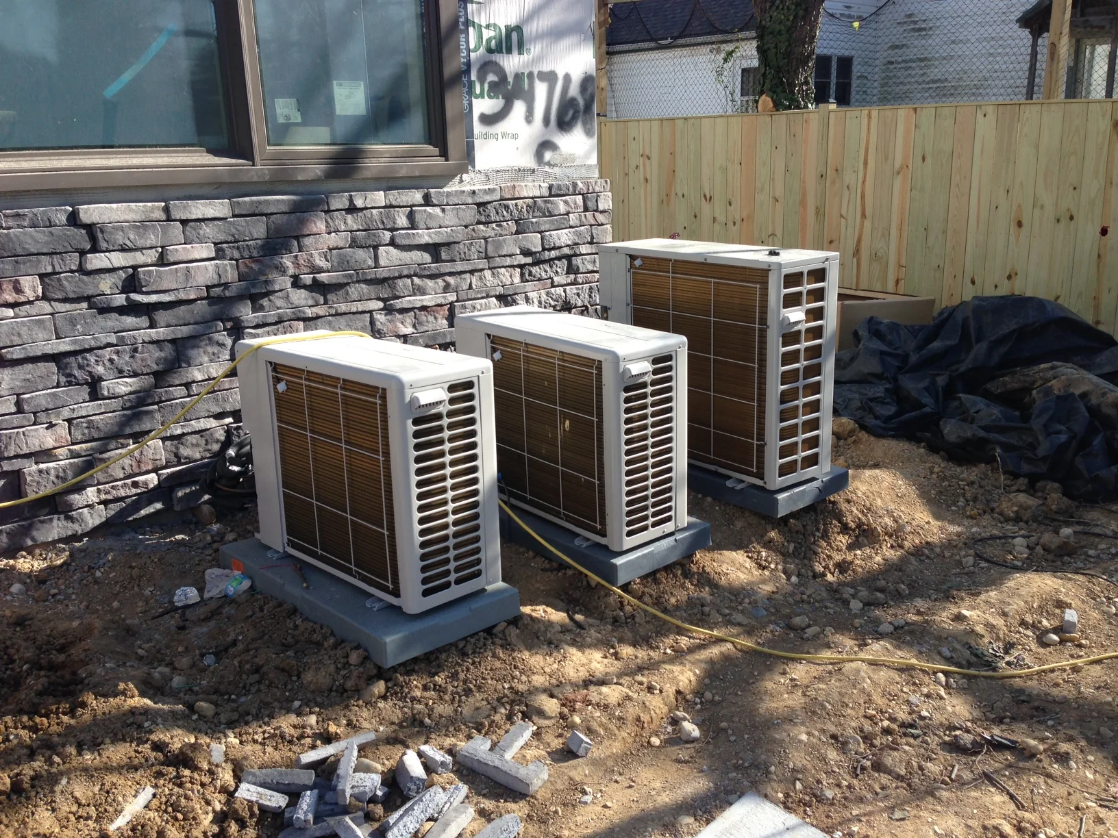 The minisplit condenser units installed. These will bring heat and cooling to 9 rooms throughout the house. Each room is individually controlled.