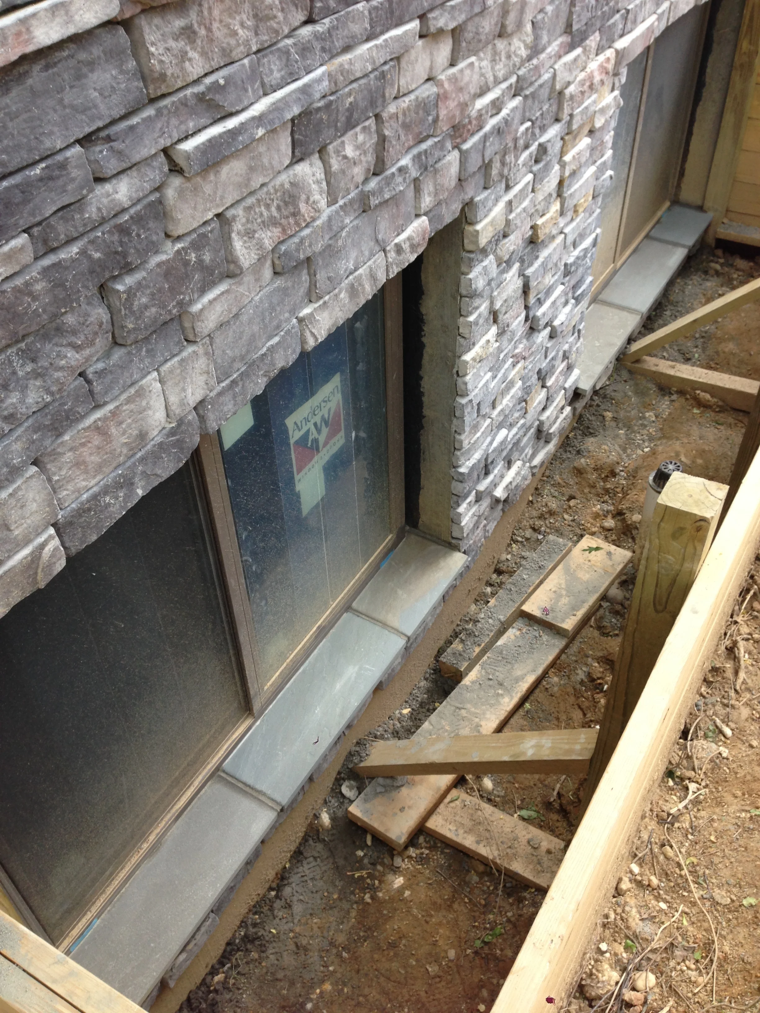 Stone sill installed. I should have used this flagstone for the water table and saved some money. Always learning.