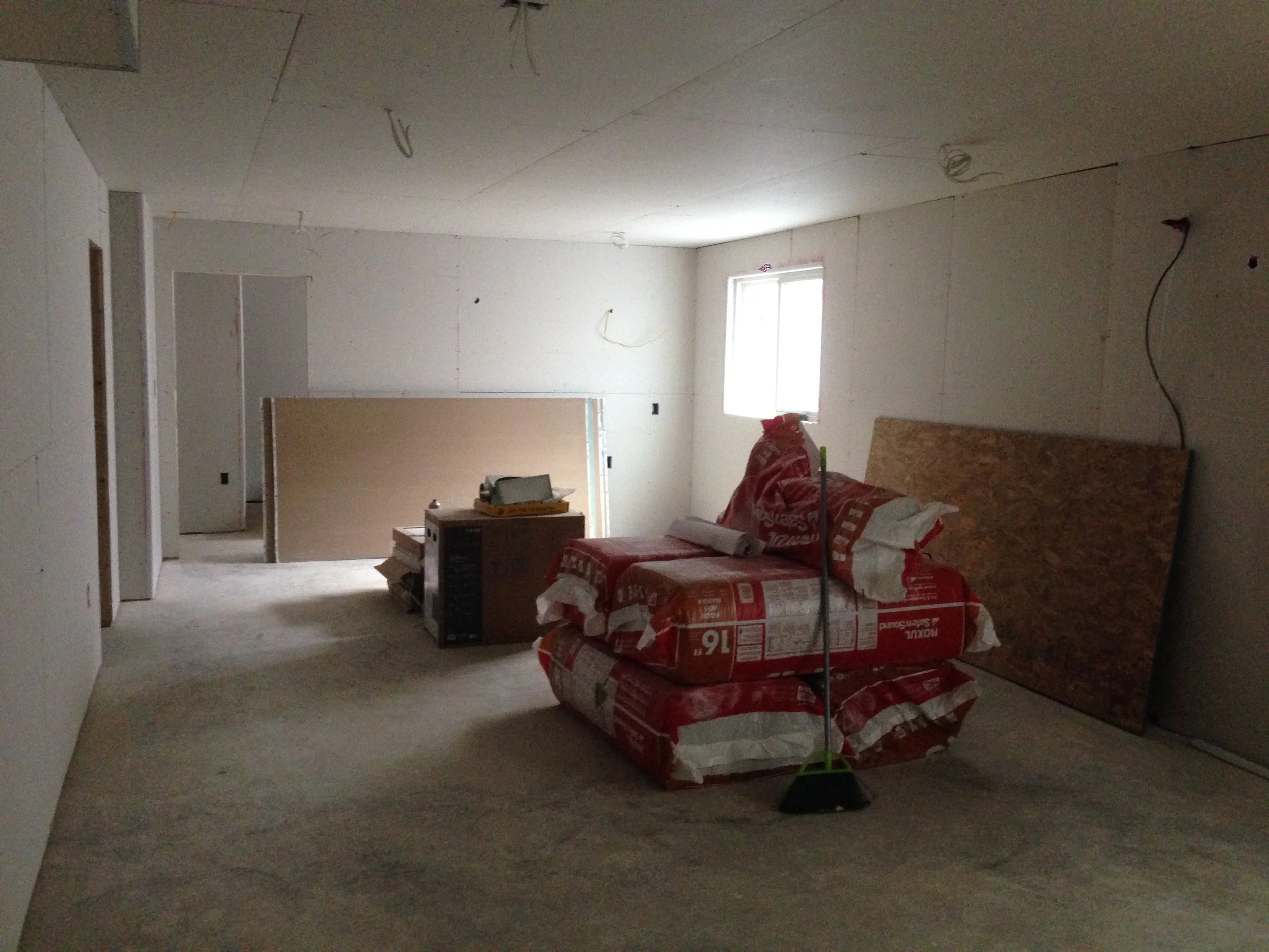 Basement drywall finally installed. It now looks like a room and somewhere someone could live. It no longer looks like a dungeon. However, I still have one storage room that does so I can still use that as a threat when Pedro and Tadeo are misbehaving.