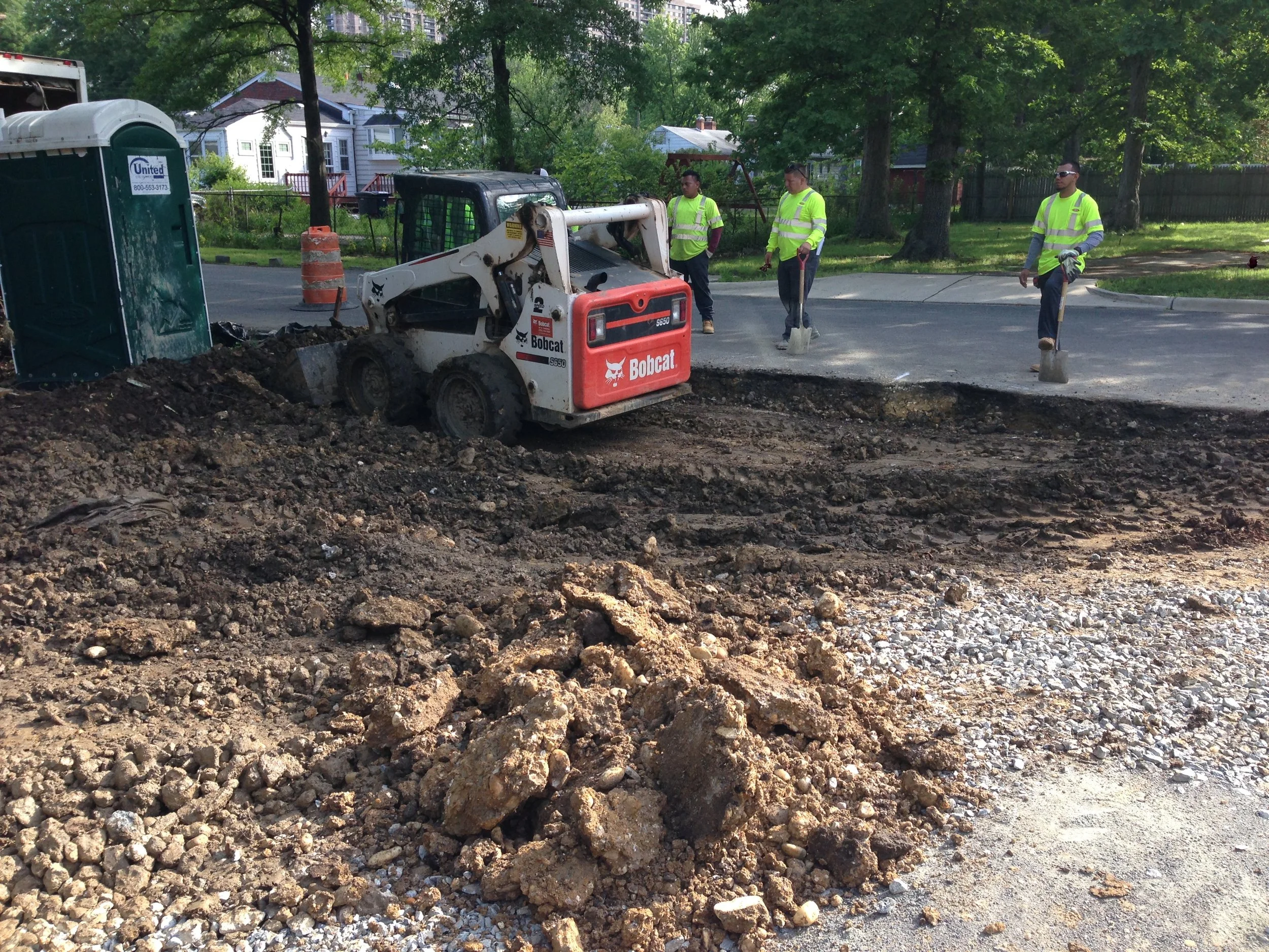 LCS grading the area for the driveway apron and sidewalk. These guys are good!