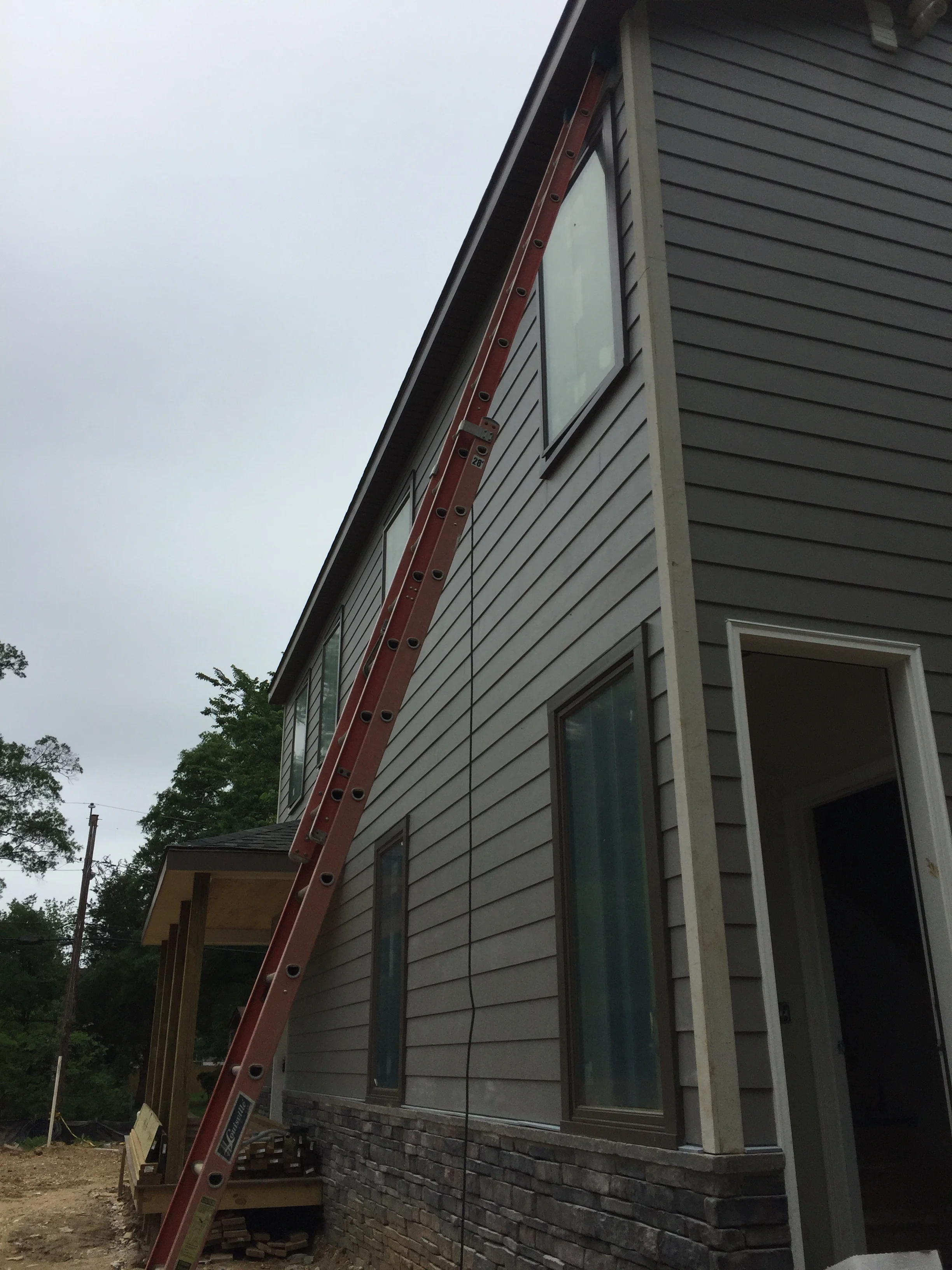 It is only 26 feet but standing on top of that ladder is kind of high. I'm also getting old. 