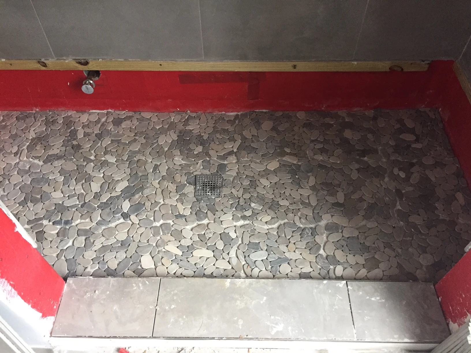 Pebble on our shower floor. Should feel delightful. 