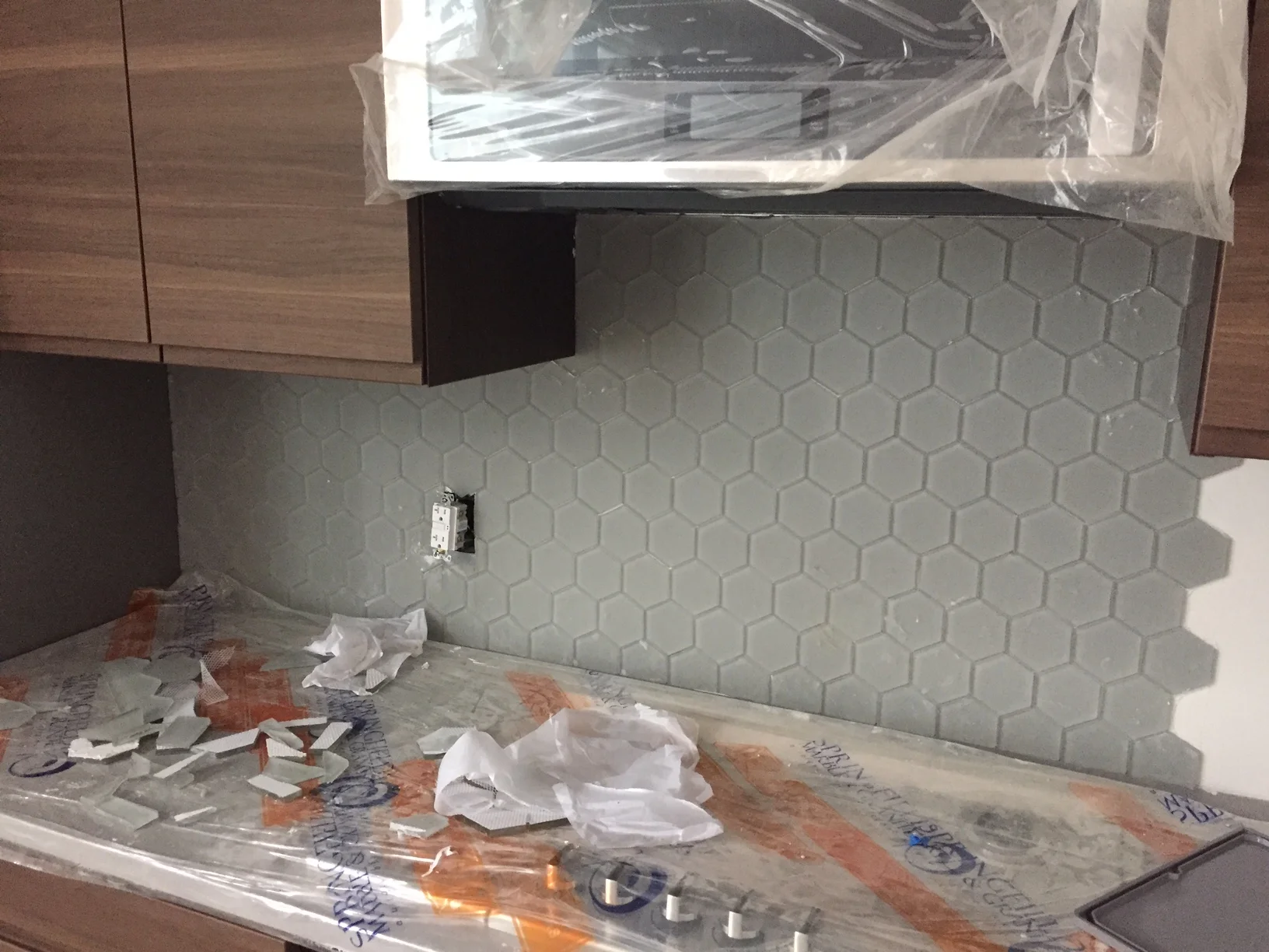Almost enough tile for the kitchen back splash. We bought two boxes but I guess it was not enough. I can't wait to cover that in grease!
