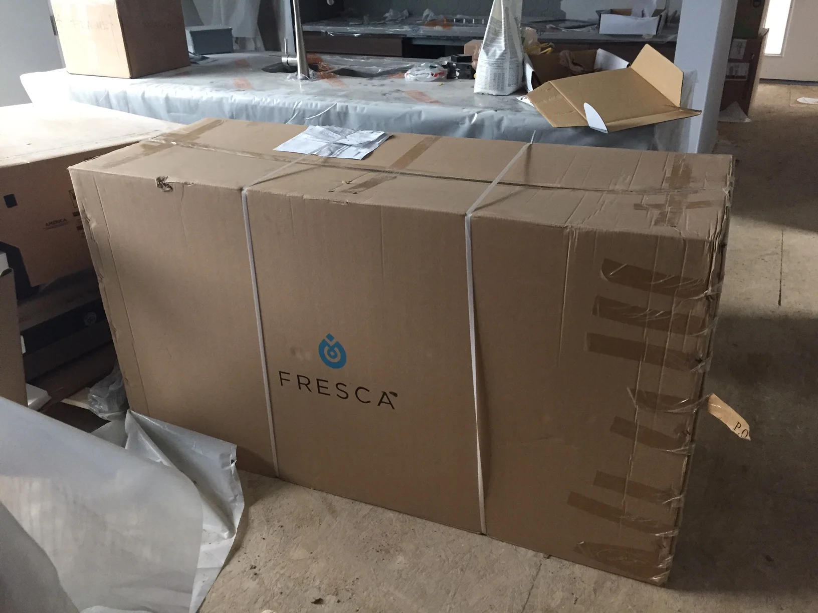 Our bathroom vanity arrived. Rudy took the other boxes upstairs but this one weighed too much. Over the weekend we will open it up and see if we can take it up in pieces.