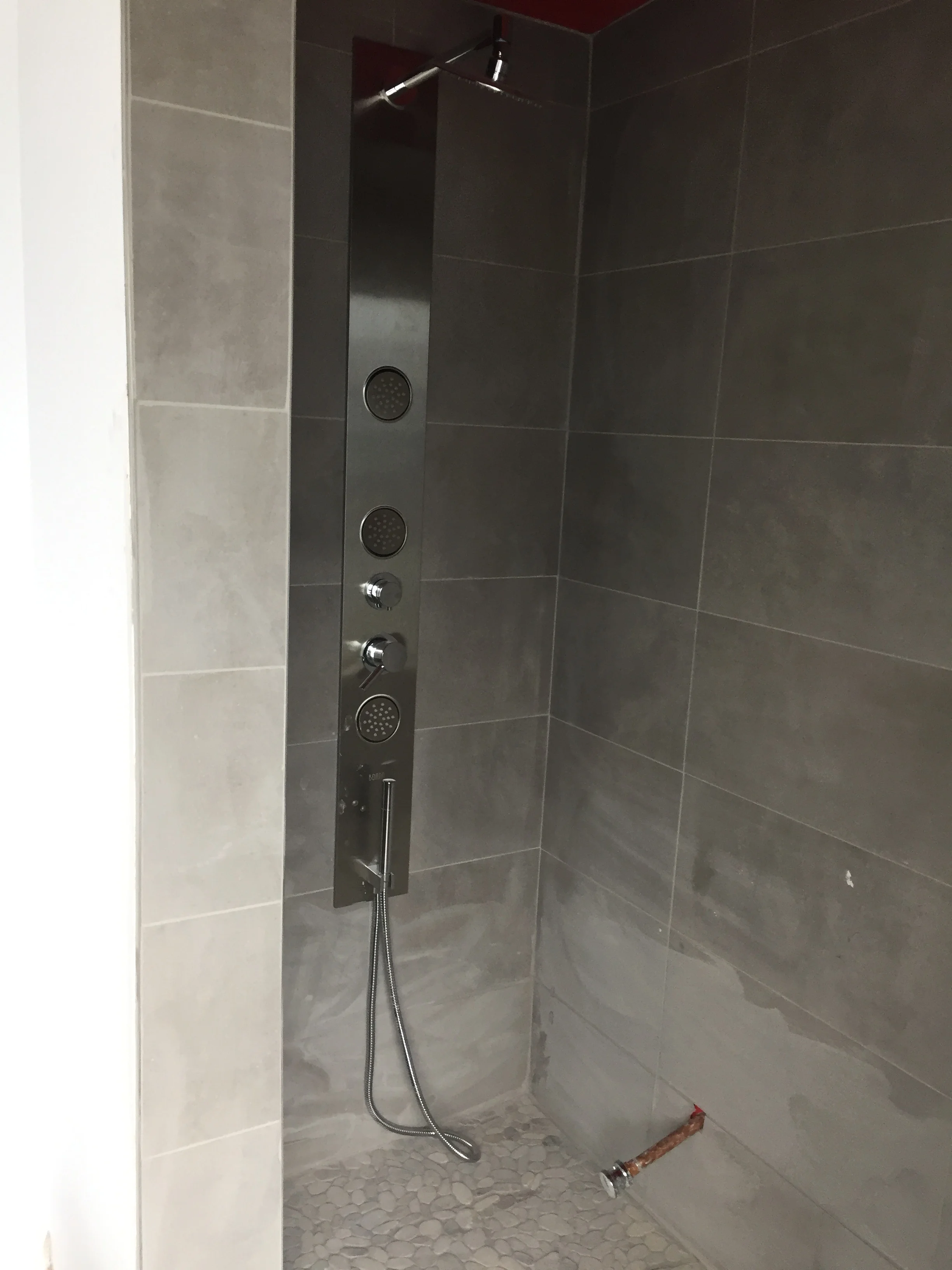 Shower almost ready. Almost. We still have to do the ceiling as we were short tiles. Again.