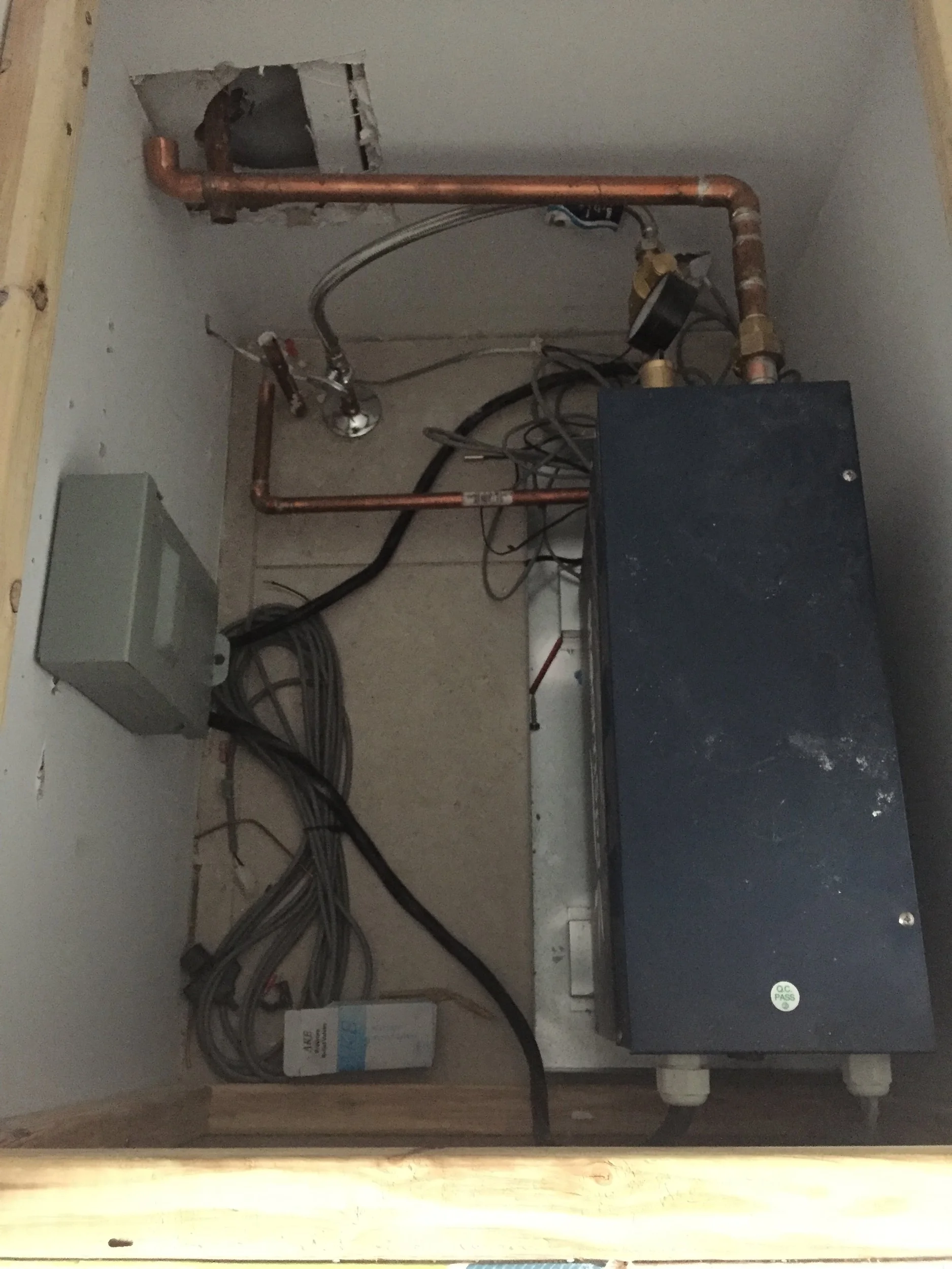 No idea if I have already shown this photo in the last 122 days but this is the steam shower kit. You can see the copper line going through the wall is where the steam will come in. This was an added expenses of $2,800 (material and labor) but I'll justify it by using it every day for 2,800 days so that the average price comes out to $1 per use which then makes this a bargain!