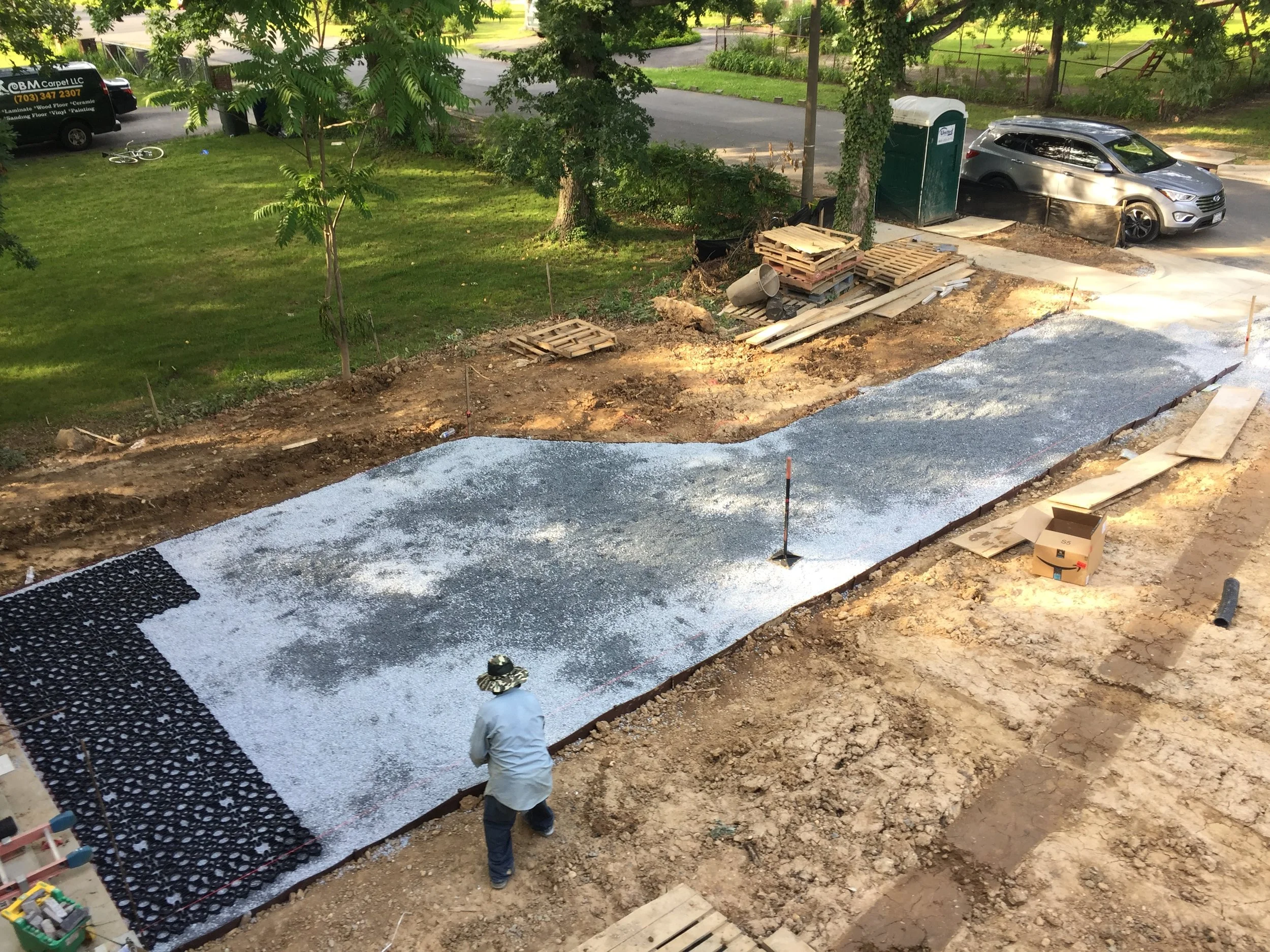 Step 5: Installing Trugrid paving system (black plastic on left hand of photo) Step 6: Install more gravel into the Trugrid interlocking system.