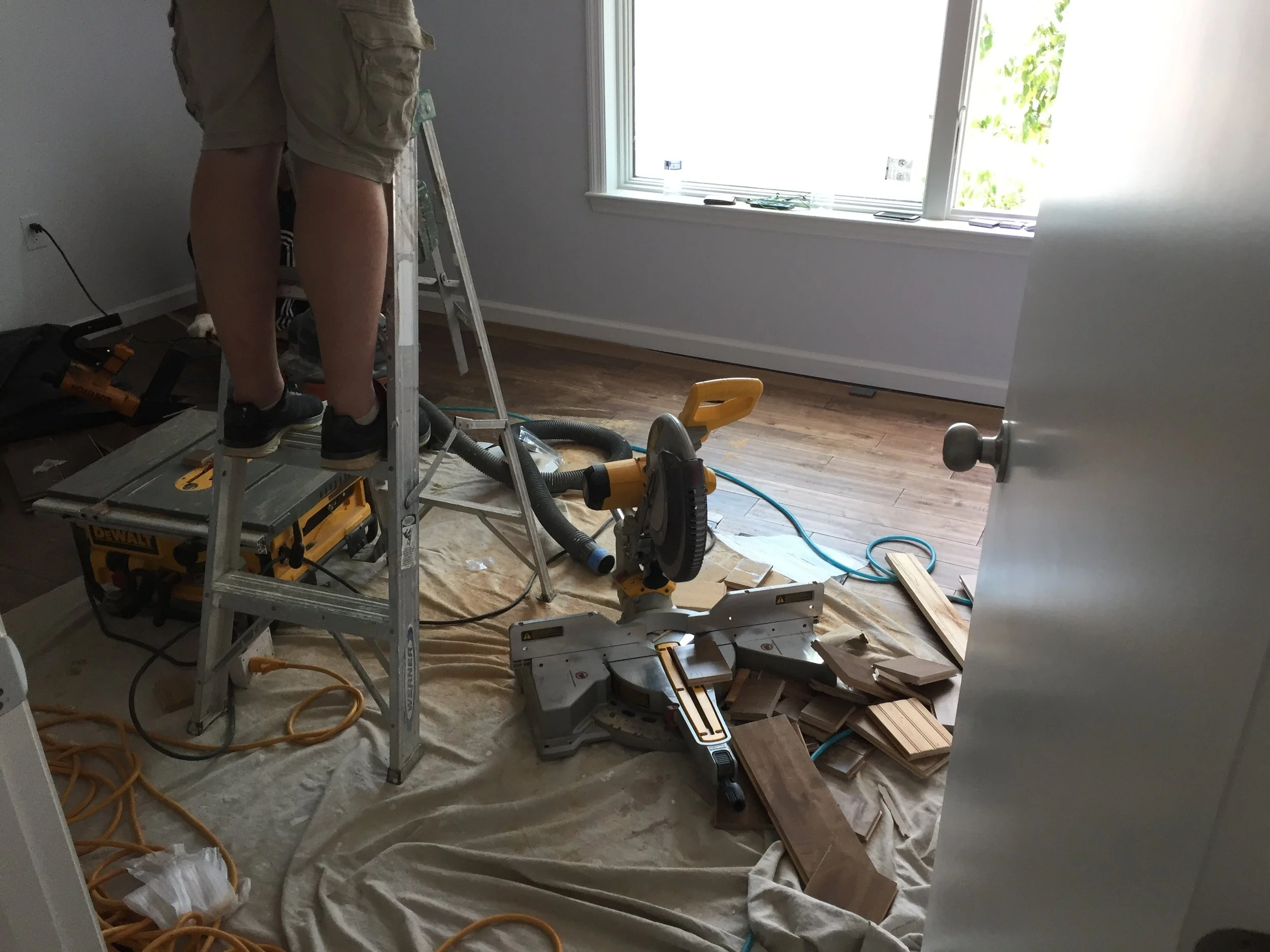 More flooring being installed today. We are nailing the floor into the wood base.