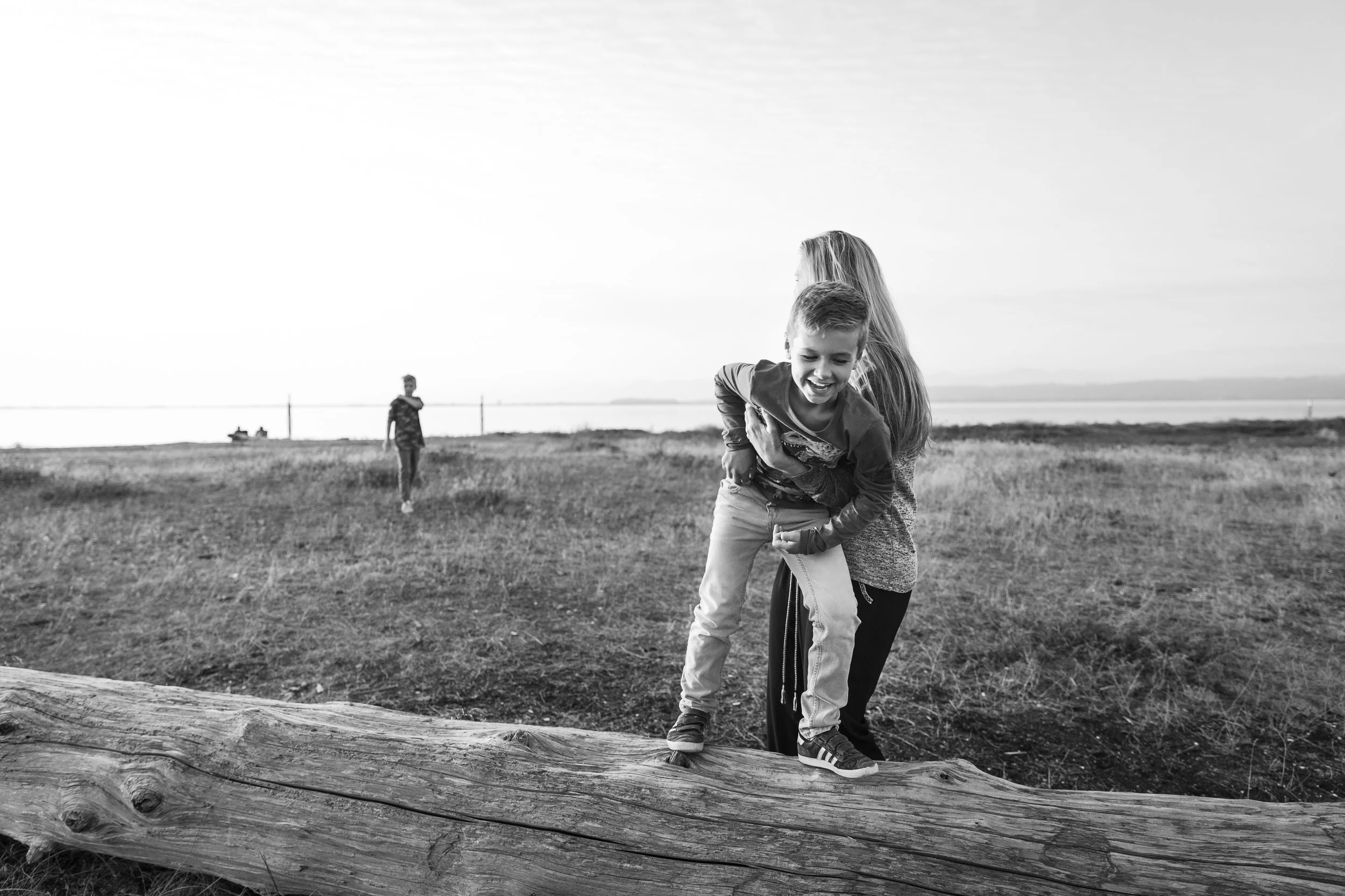 mom with son on beach blackie spit