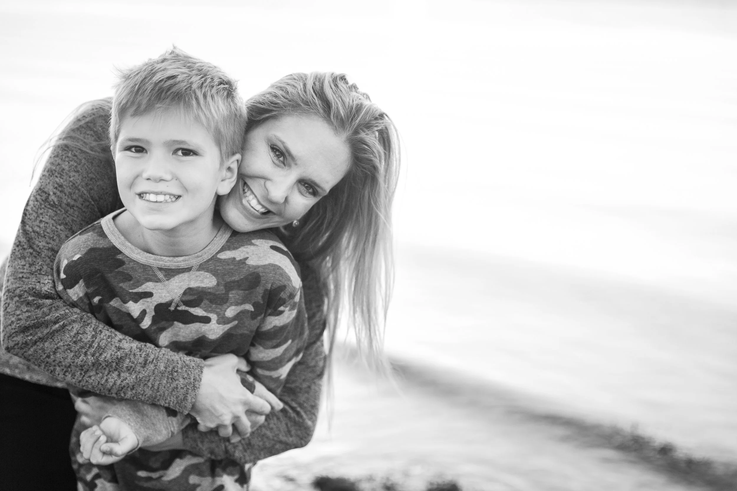 mom with son on the beach in surrey