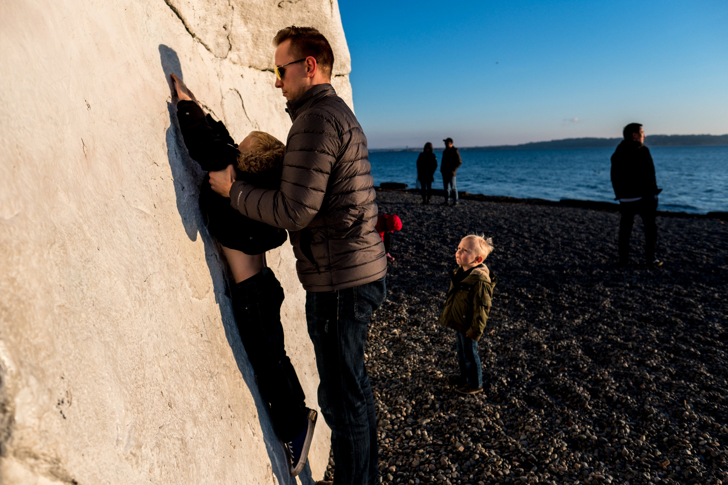 kids climbing white rock in canada cold dad