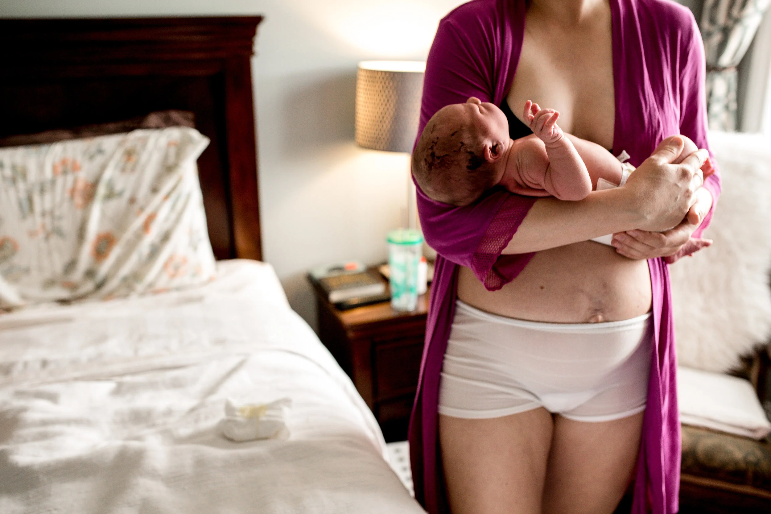 mom-newborn-holding-bed-mesh-panties.jpg