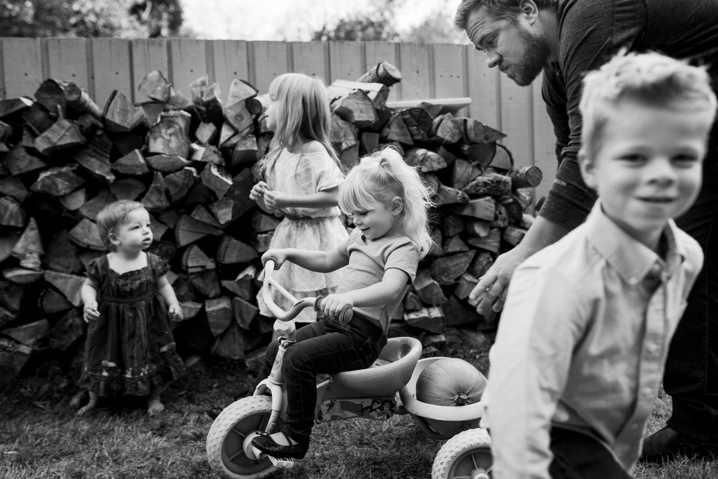 chaos+in+black+and+white+with+kid+riding+a+tricycle.jpg