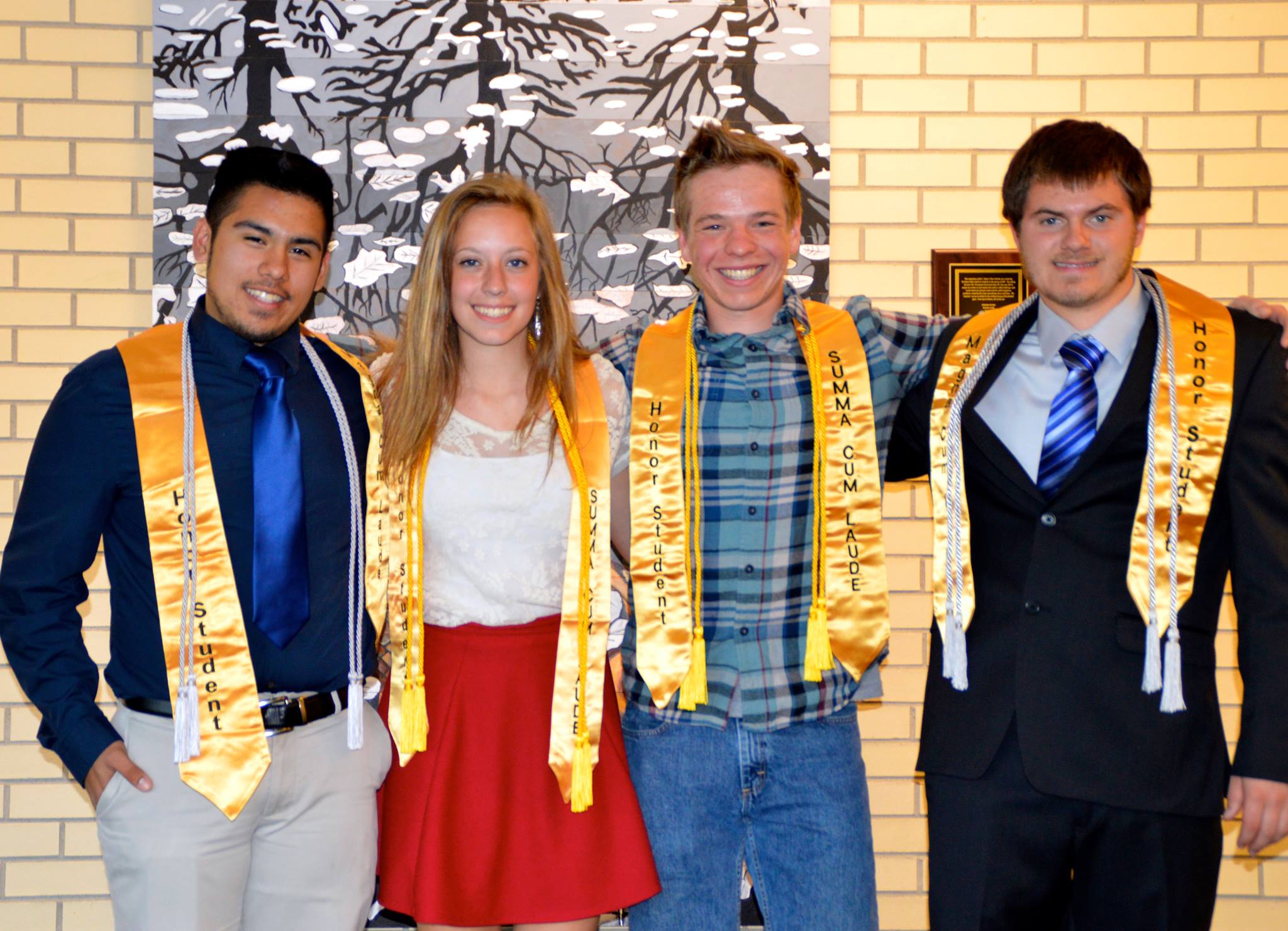 2015 Qualified Northport Promise Scholarship Graduates! LEFT TO RIGHT: FABIAN HERNANDEZ, AUTUMN HUCK, ANDY SLEDER, DEVON DEVRIENDT. Photo by Dan Duffiney