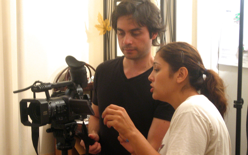 Framing up a shot with cinematographer Alain Aguilar.