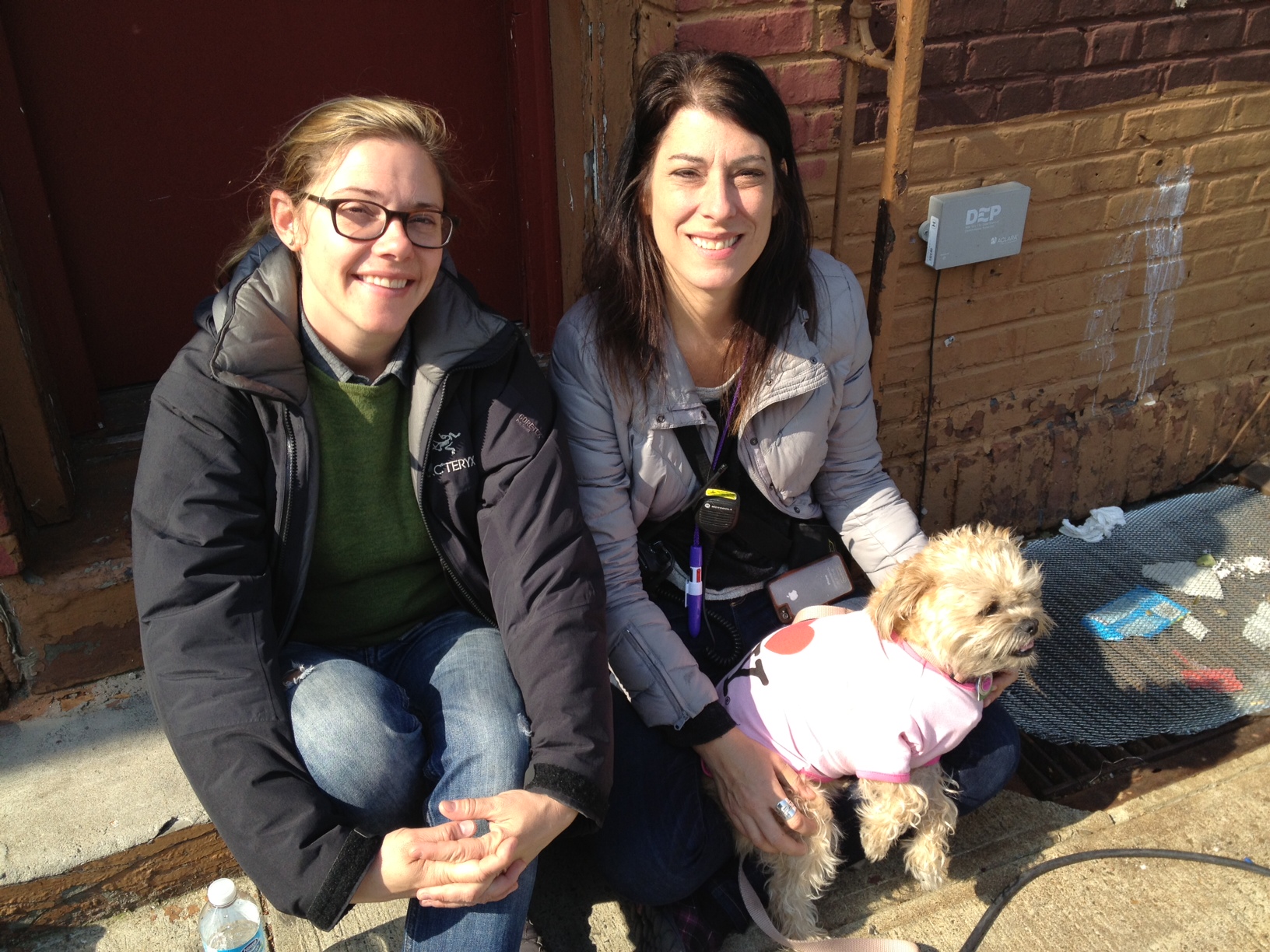 Co-Producer Lynn Appelle (right) on the set of “Rob the Mob” with 2nd AD Sarah Fairchild & Bitsy (Lynn’s dog, working as an extra that day) | Photo: Phil Caruso