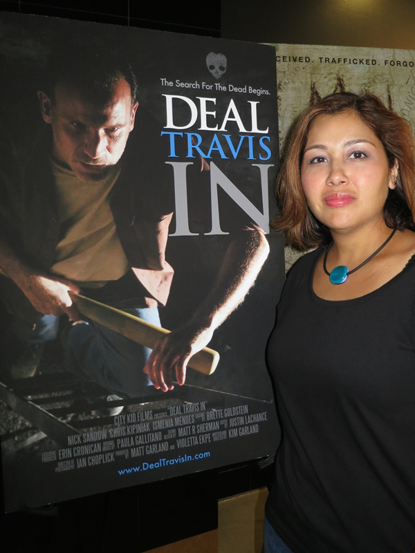 A girl and her film poster.
