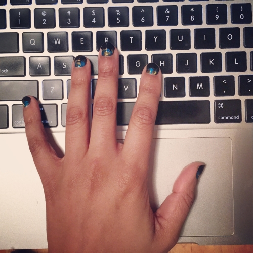 this is a photo of my hand and the fancy manicure i got. if i actually opened up, i'd tell you about the experience and how i am enamored with them and feel cool for actually getting my nails did, but alas, this post is about how i don't tell such stories most of the time. 