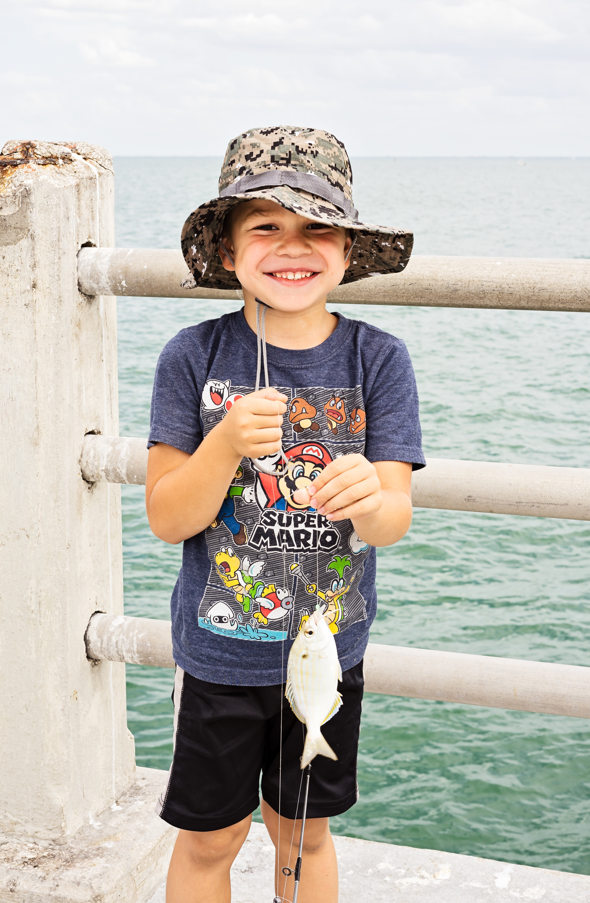 Matthew, out on the pier with his grandfather, caught this pinfish. 