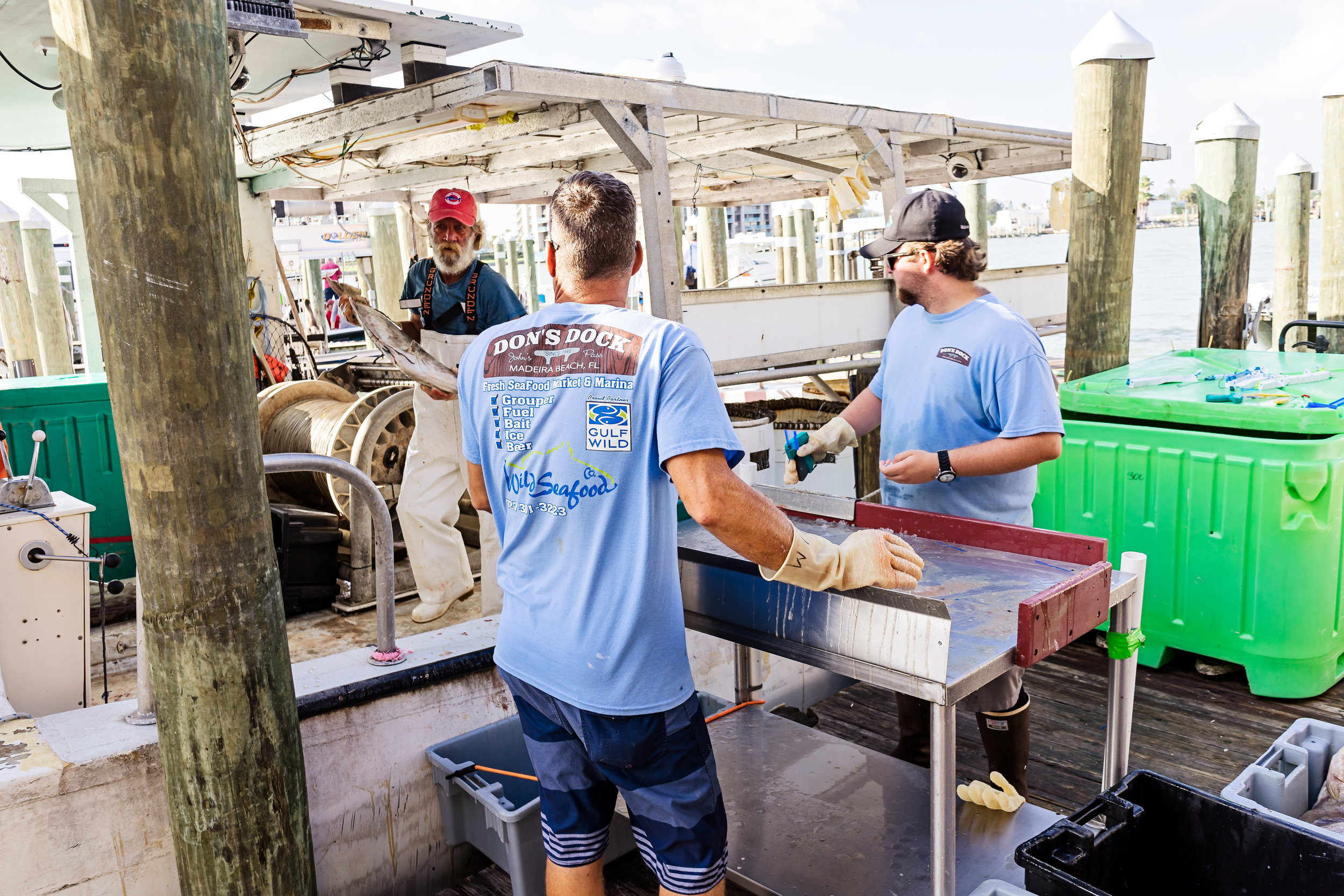 Chris Zook and Tyler Lavrinc sorting and tagging the fish as it comes off the boat.