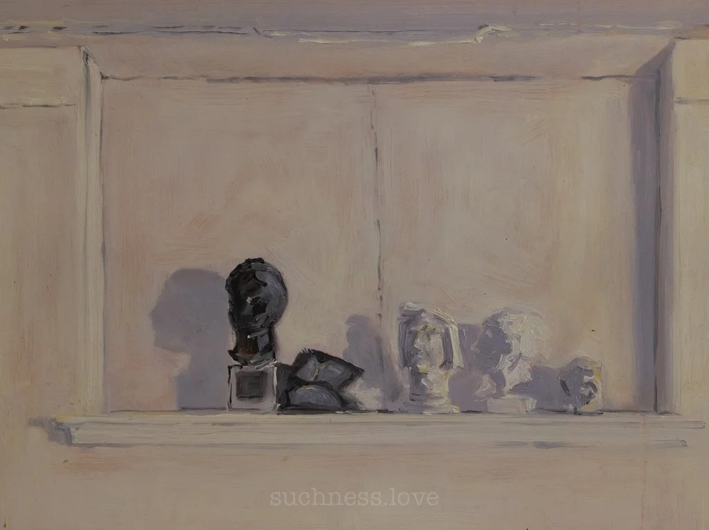 Painted still life depicting busts and sculptures on a shelf or ledge against a neutral wall.