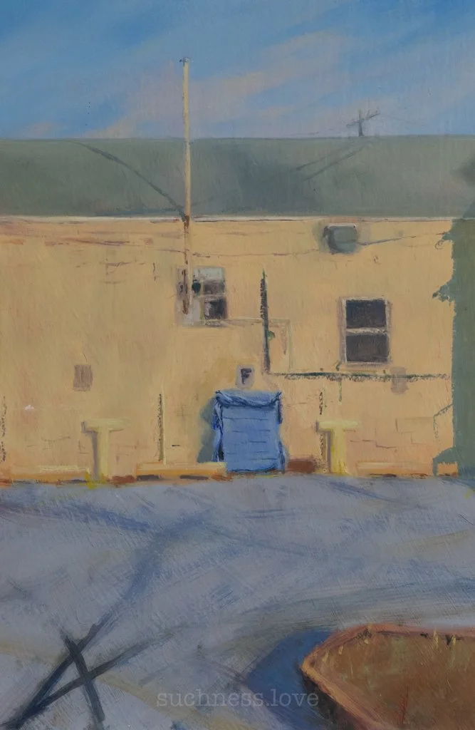 Painting of an urban alley with a yellow building, grey garage door, and two small windows, under a blue sky with power lines.