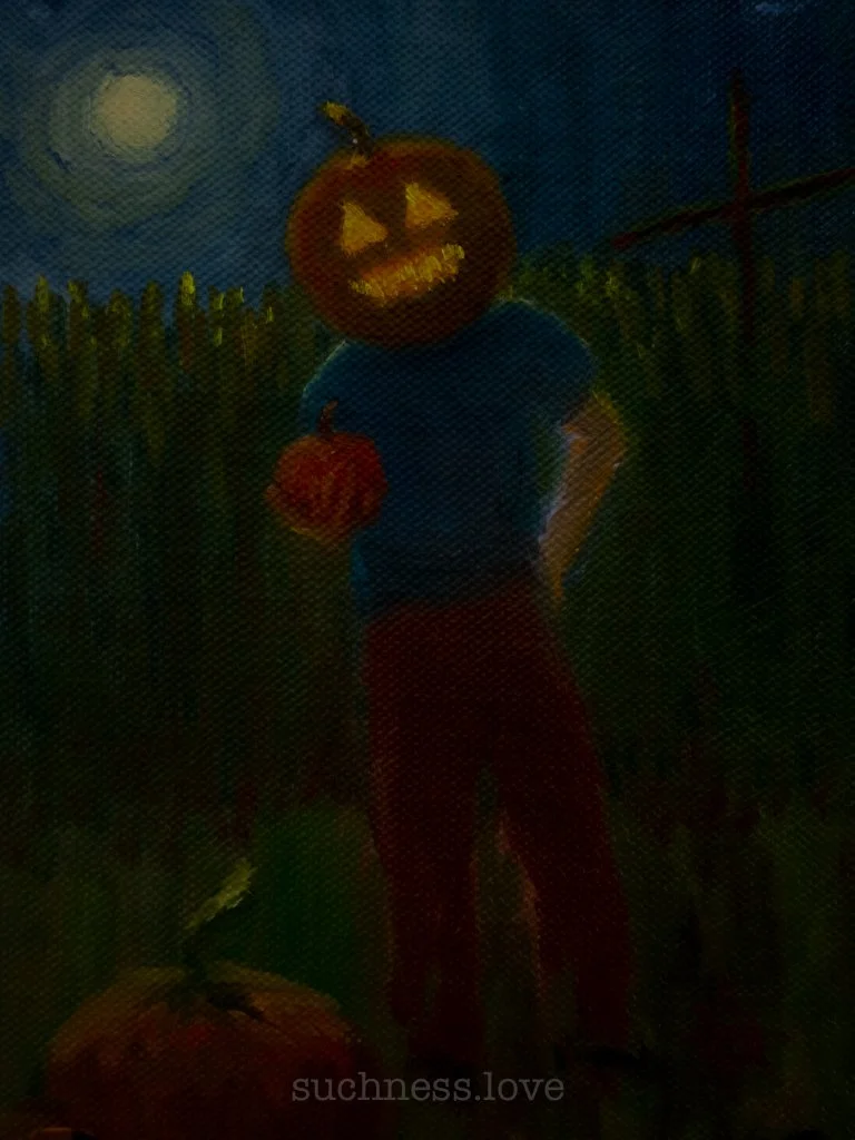 Person with a pumpkin head carved with a face, standing outside at night with a full moon in the sky, holding a small pumpkin, surrounded by tall grass and other pumpkins, dressed in casual clothes, celebrating Halloween.