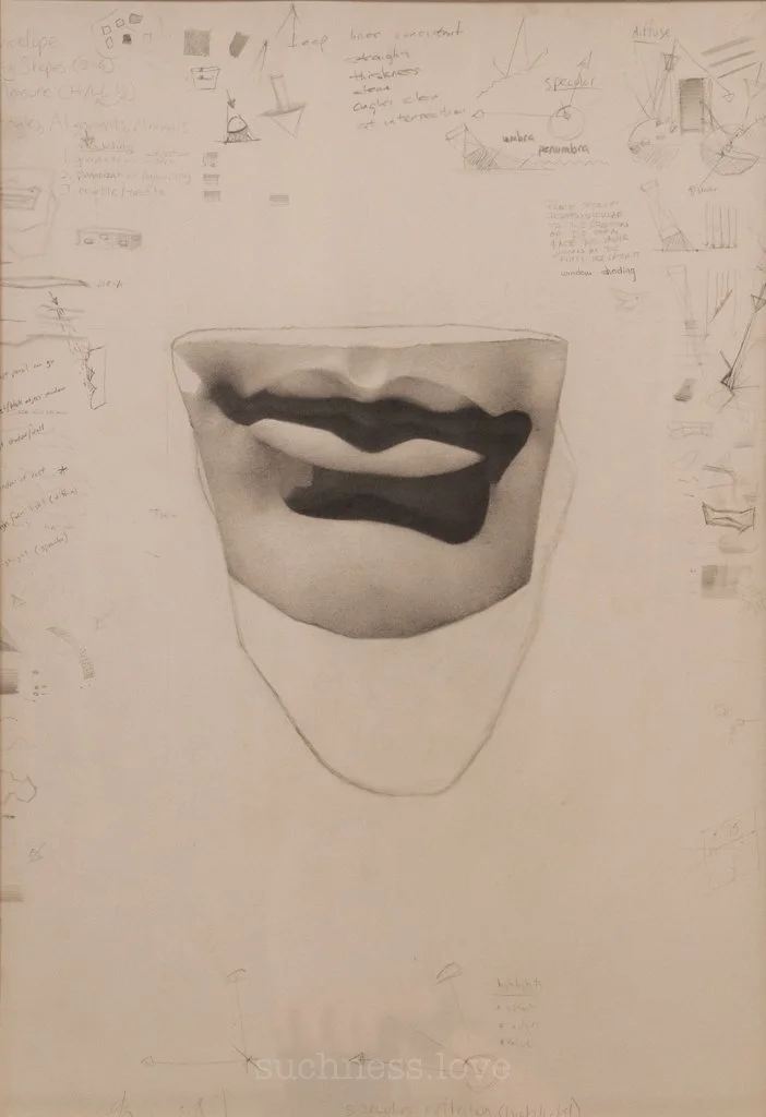 Sketch of a mouth with lips, shaded for depth, on a sheet of paper with handwritten notes and diagrams surrounding it.