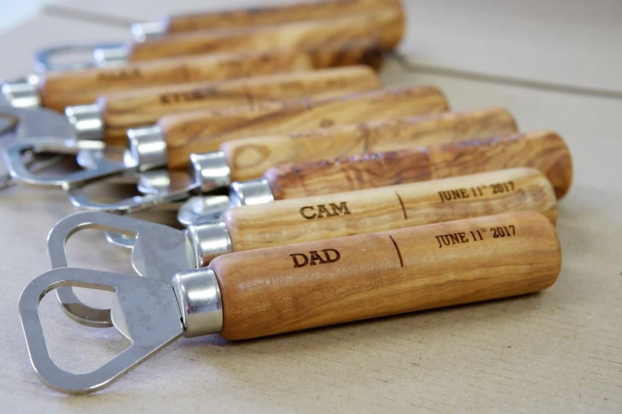 Personalised laser engraved bottle openers.