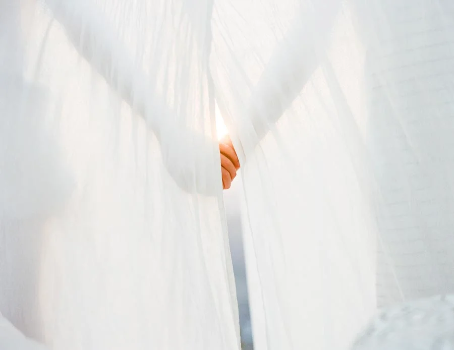 Photo of held hands in beautiful light.jpg
